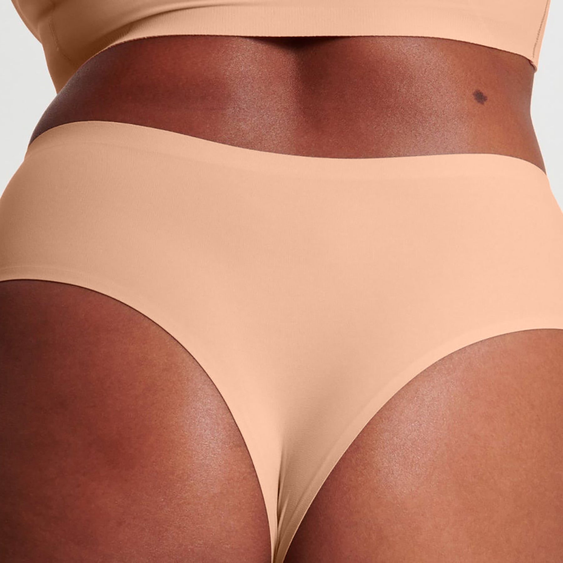 Close-up of waistband and fit on Evelyn & Bobbie Himalayan Salt high rise thong