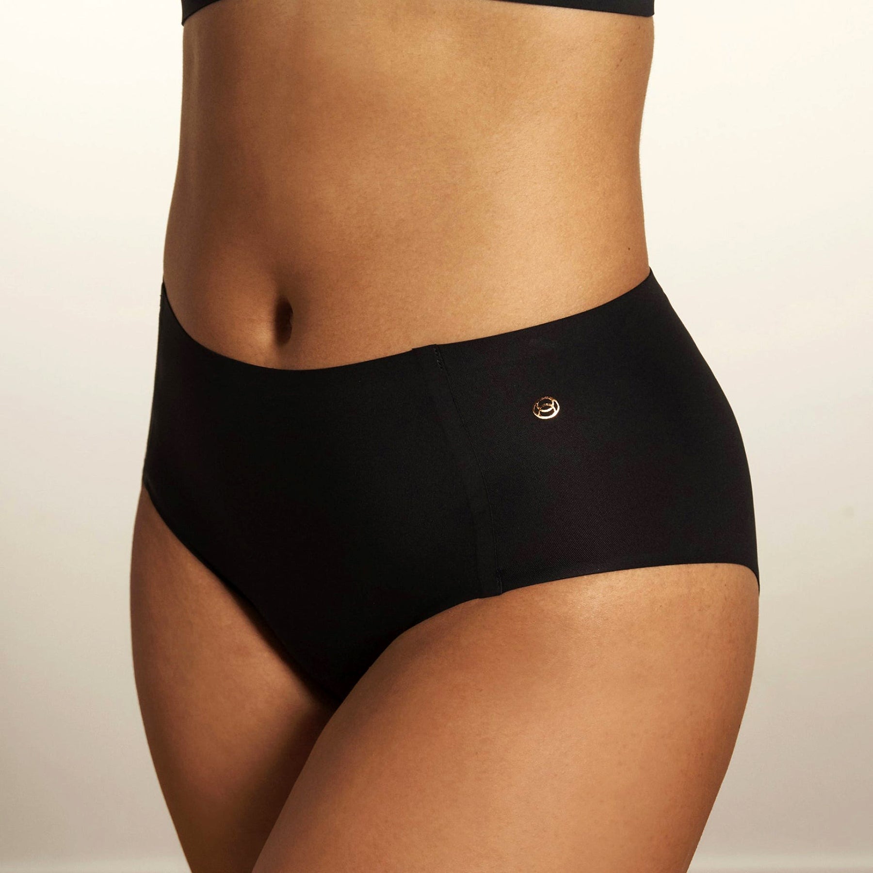 Side view of black Evelyn & Bobbie high rise seamless full coverage underwear