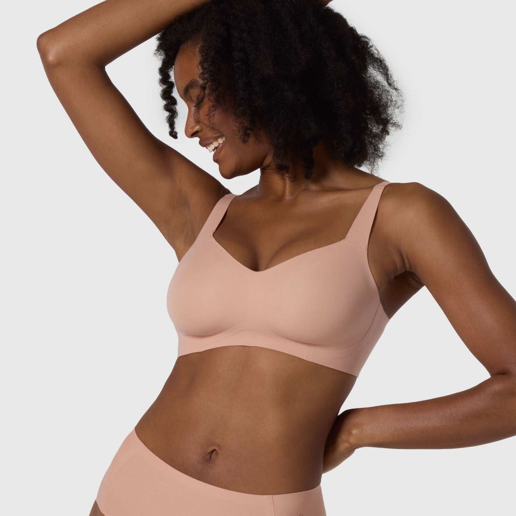Model wearing Evelyn & Bobbie Himalayan Salt Beyond Wireless Hook & Eye Bra – front view with matching underwear