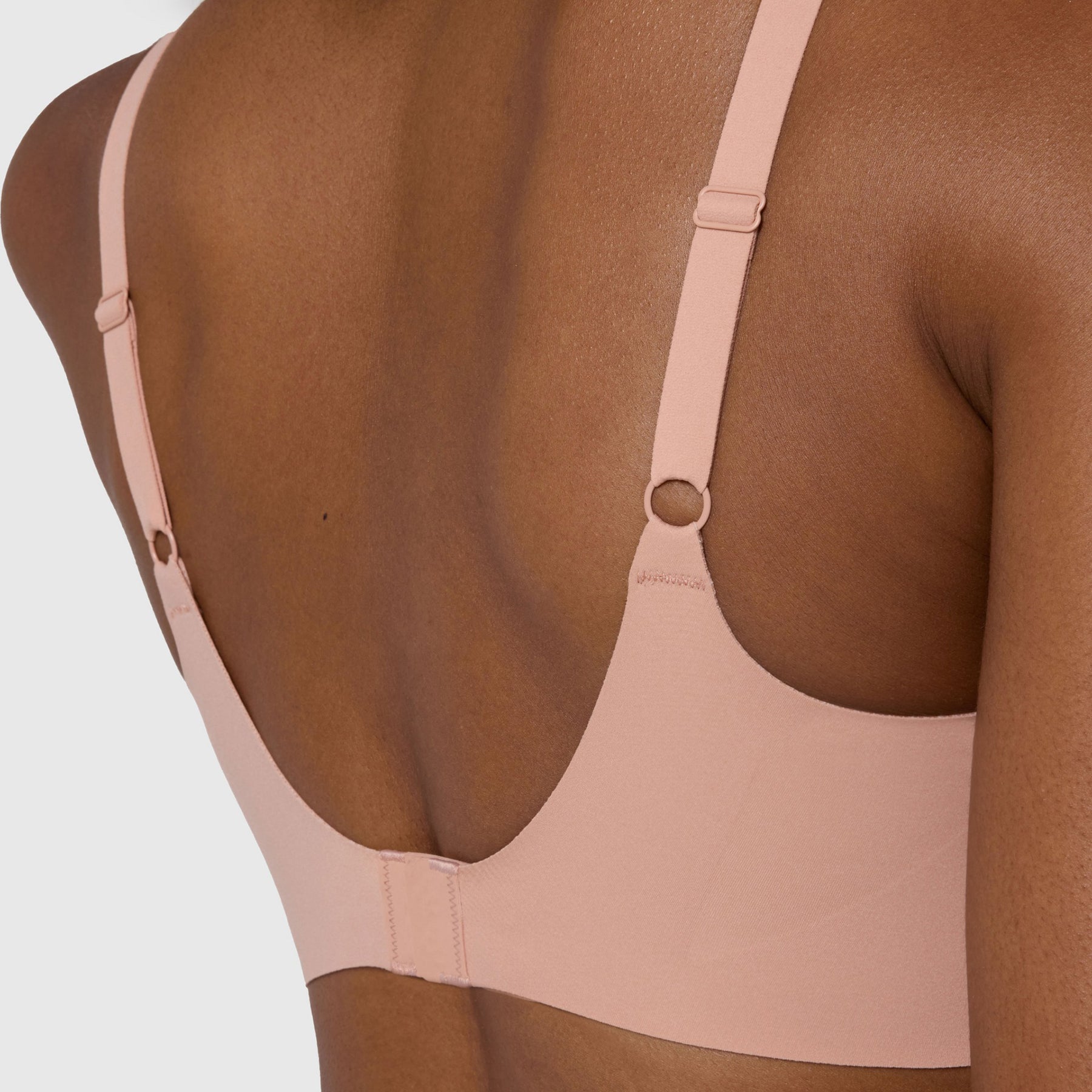 Close-up of back closure and straps on Evelyn & Bobbie Himalayan Salt Beyond Wireless Hook & Eye Bra