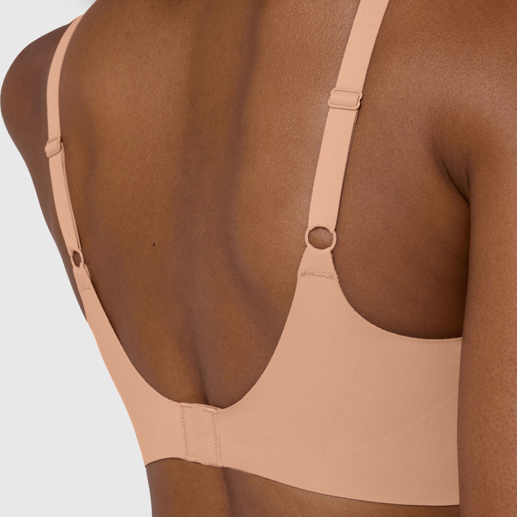 Close-up of back closure and straps on Evelyn & Bobbie Himalayan Salt Beyond Wireless Hook & Eye Bra