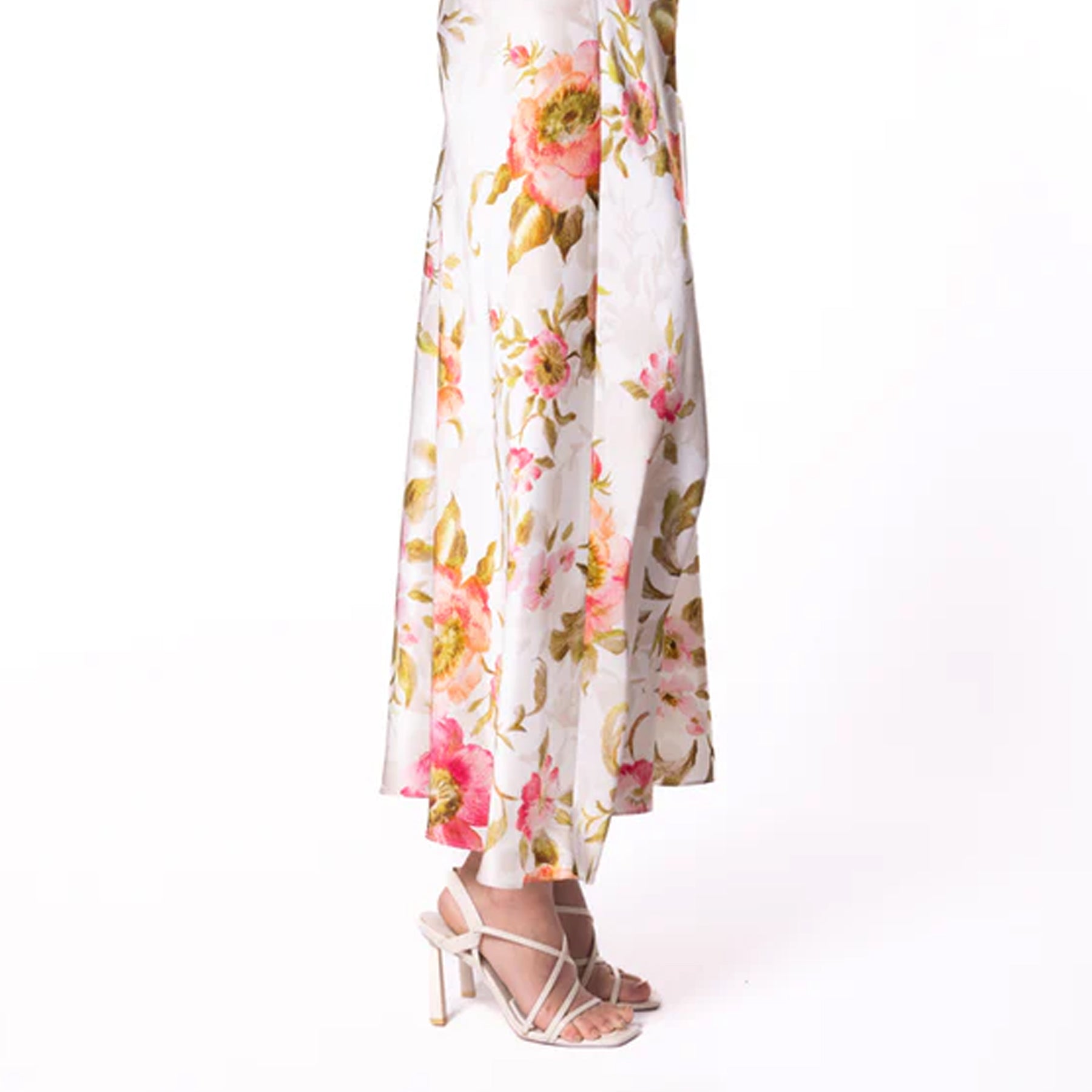 Close-up of the lower portion of the nightgown highlighting the drape and floral print detail.