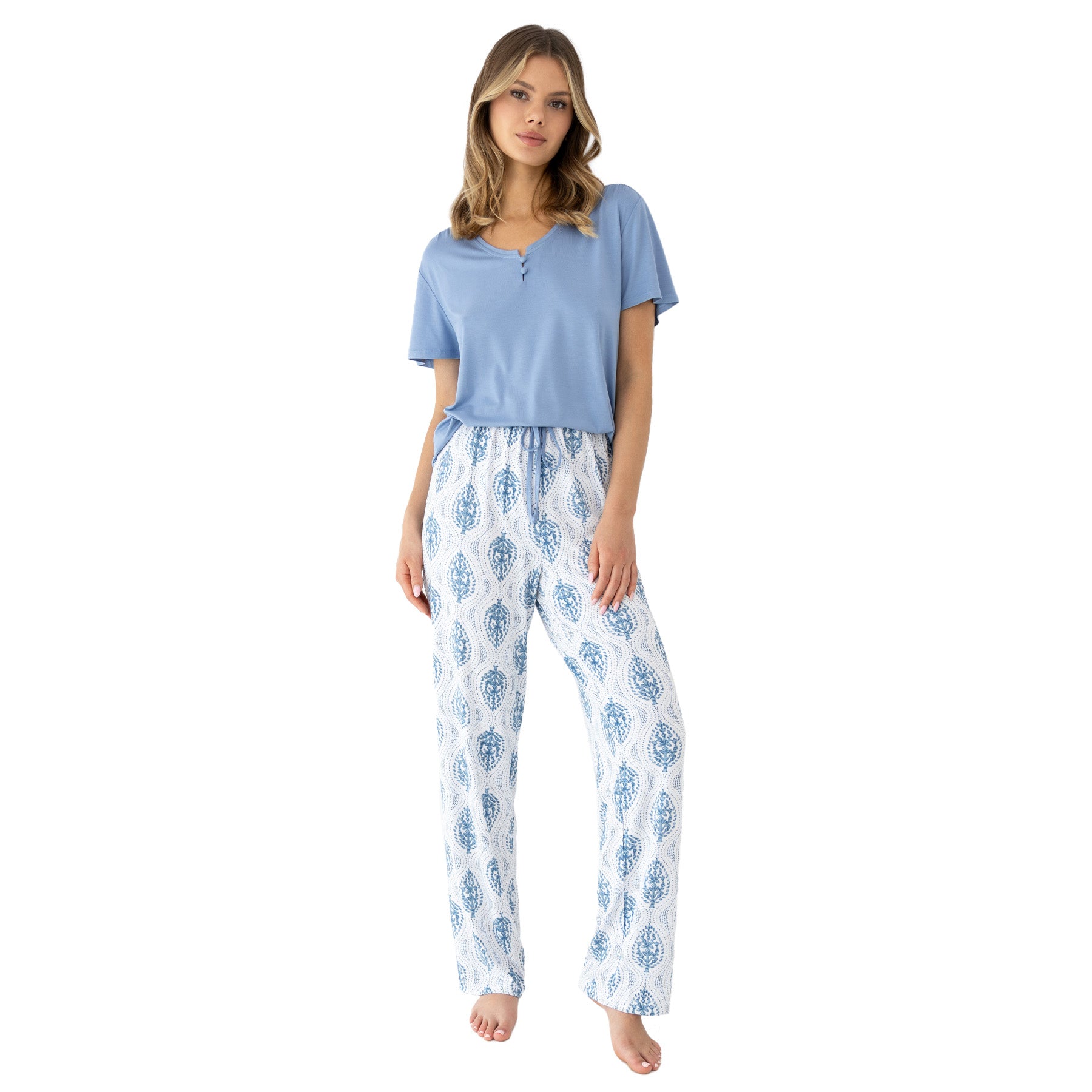 Women’s blue short sleeve pyjama set with soft solid top and printed wide-leg pants in white and blue pattern, relaxed fit