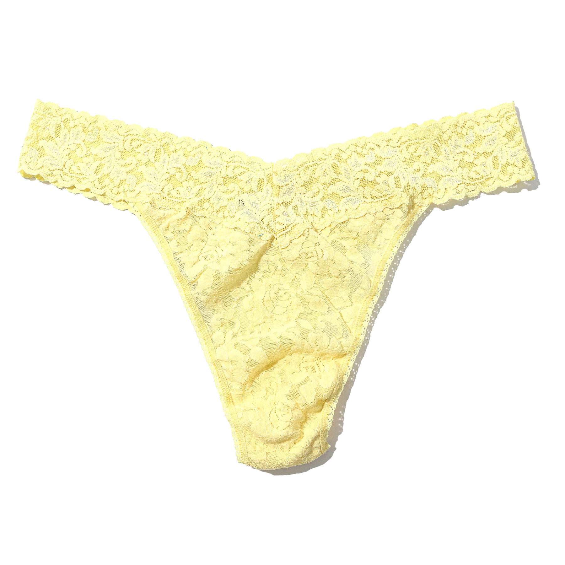 Hanky Panky lace original rise thong in it's bananas pale yellow, flat lay without model.