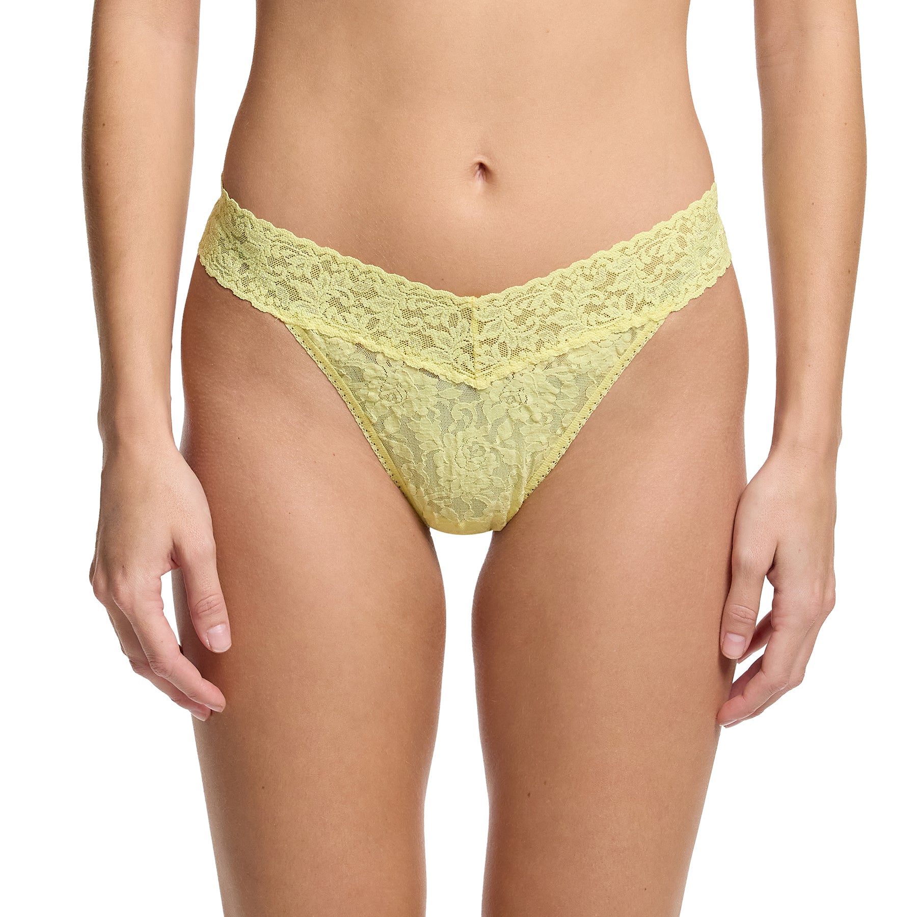 Hanky Panky lace original rise thong in it's bananas pale yellow, front view on model.