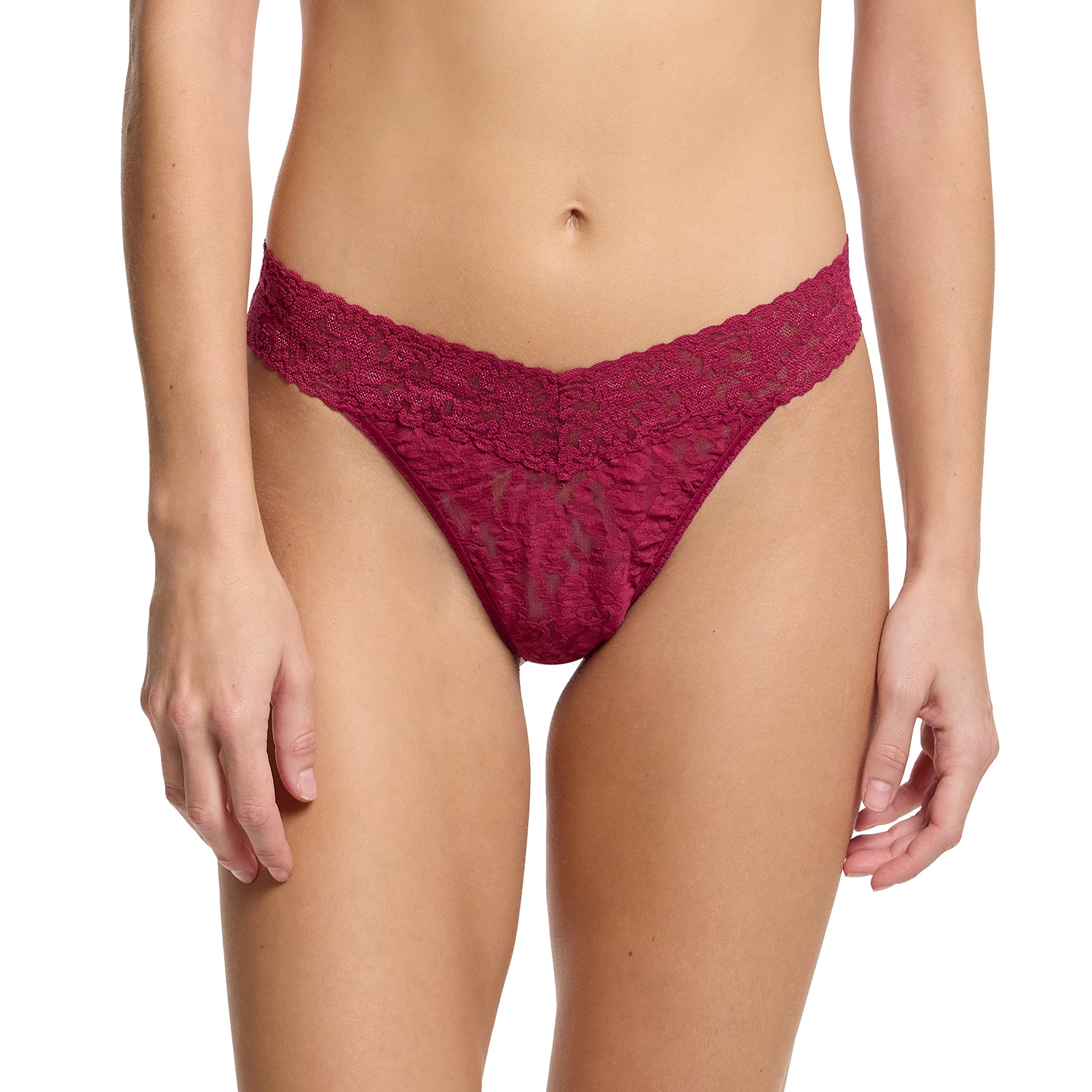 Woman wearing Hanky Panky Original Rise Thong in Merlot – stretch lace thong in deep wine red with flattering low-rise fit and floral lace design.