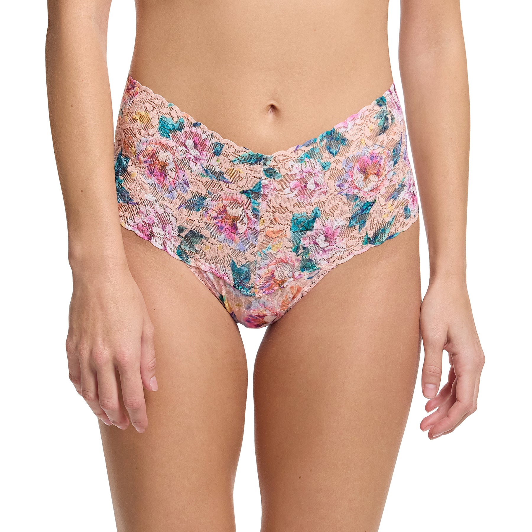 Front view of woman wearing Hanky Panky Printed Retro Thong in Buy Myself Flowers – high-rise lace thong with wide waistband and colorful floral design.