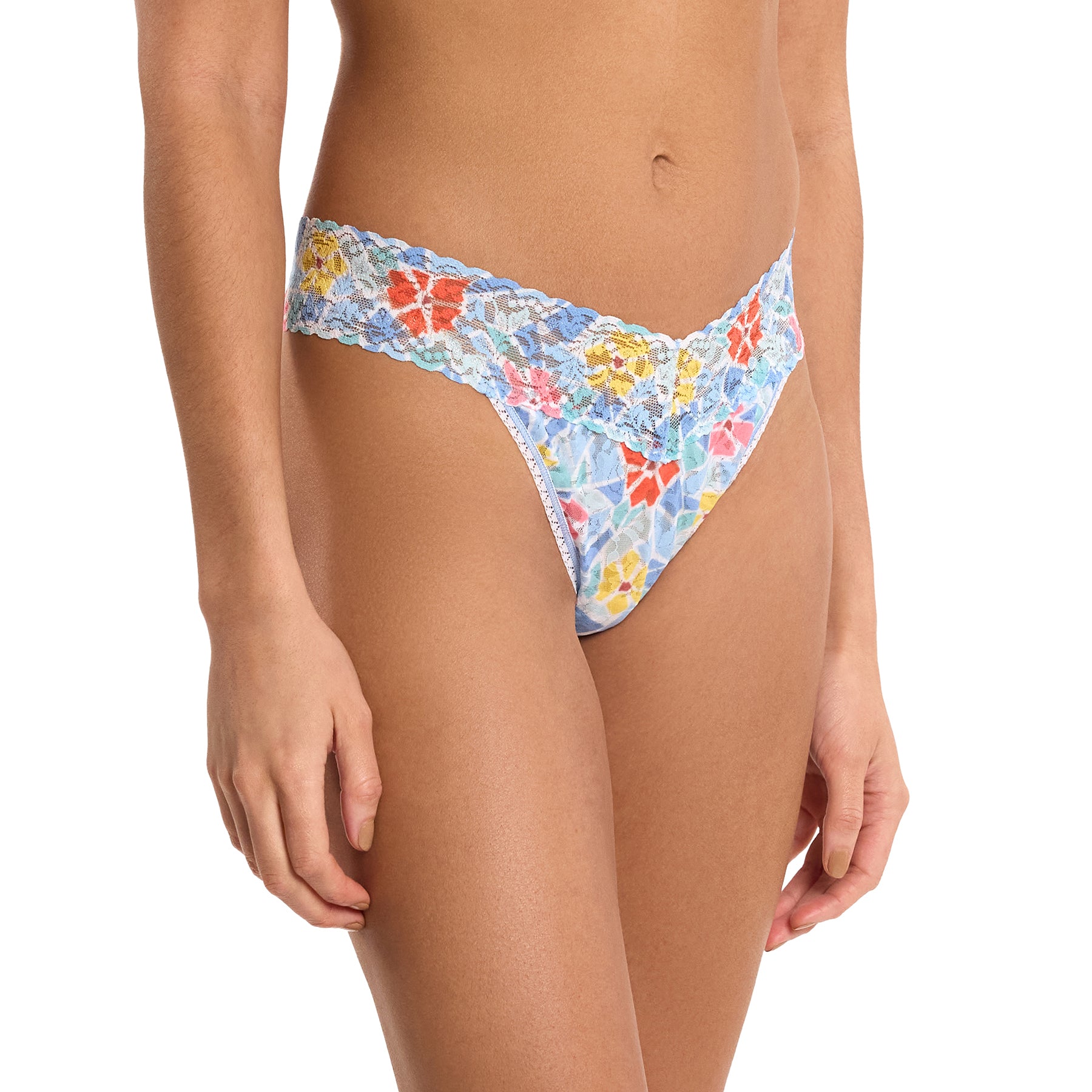 Side view of Hanky Panky lace thong in blue, red, and yellow mosaic print.