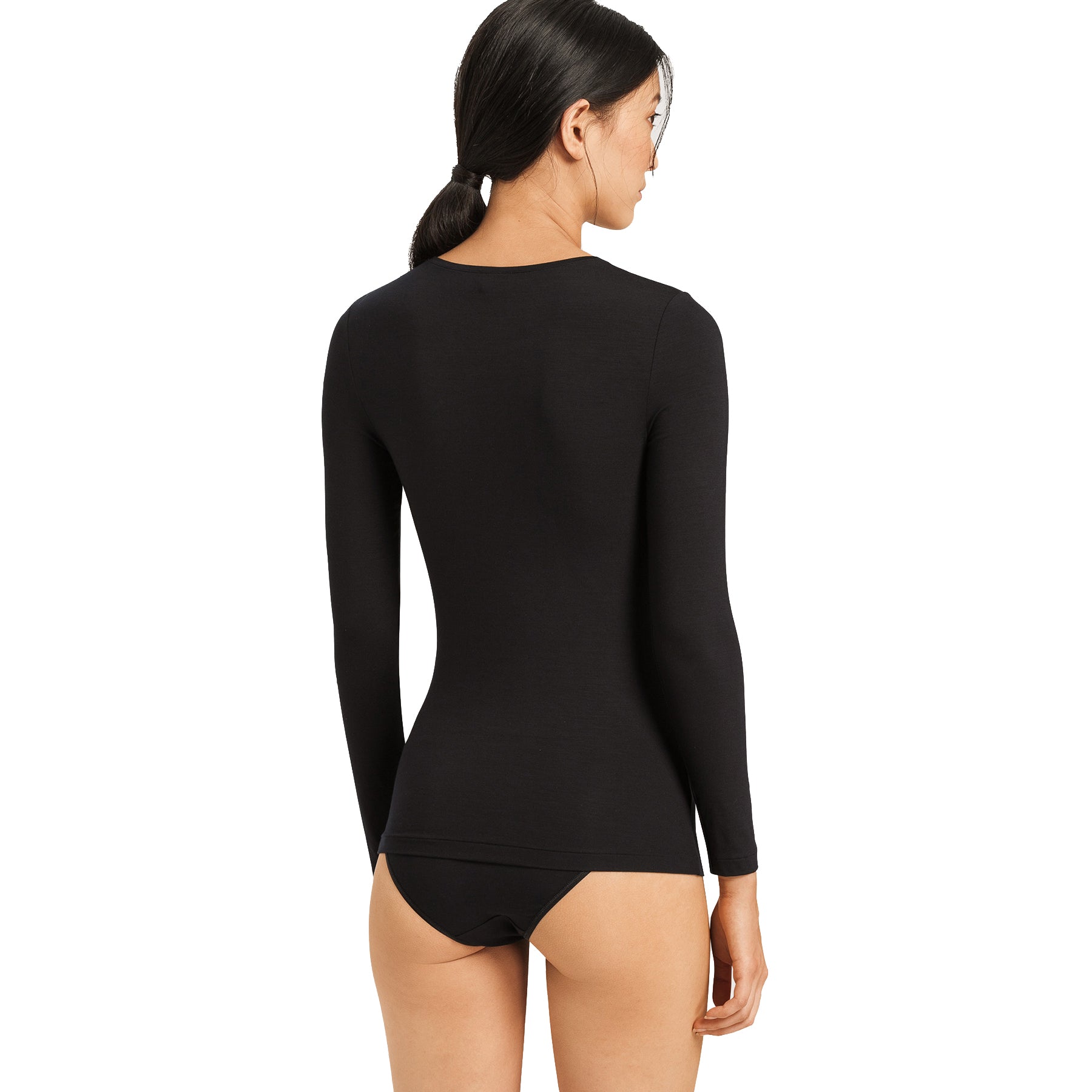 Hanro Soft Touch black long sleeve top back view on model, showcasing smooth silhouette and comfortable stretch fit