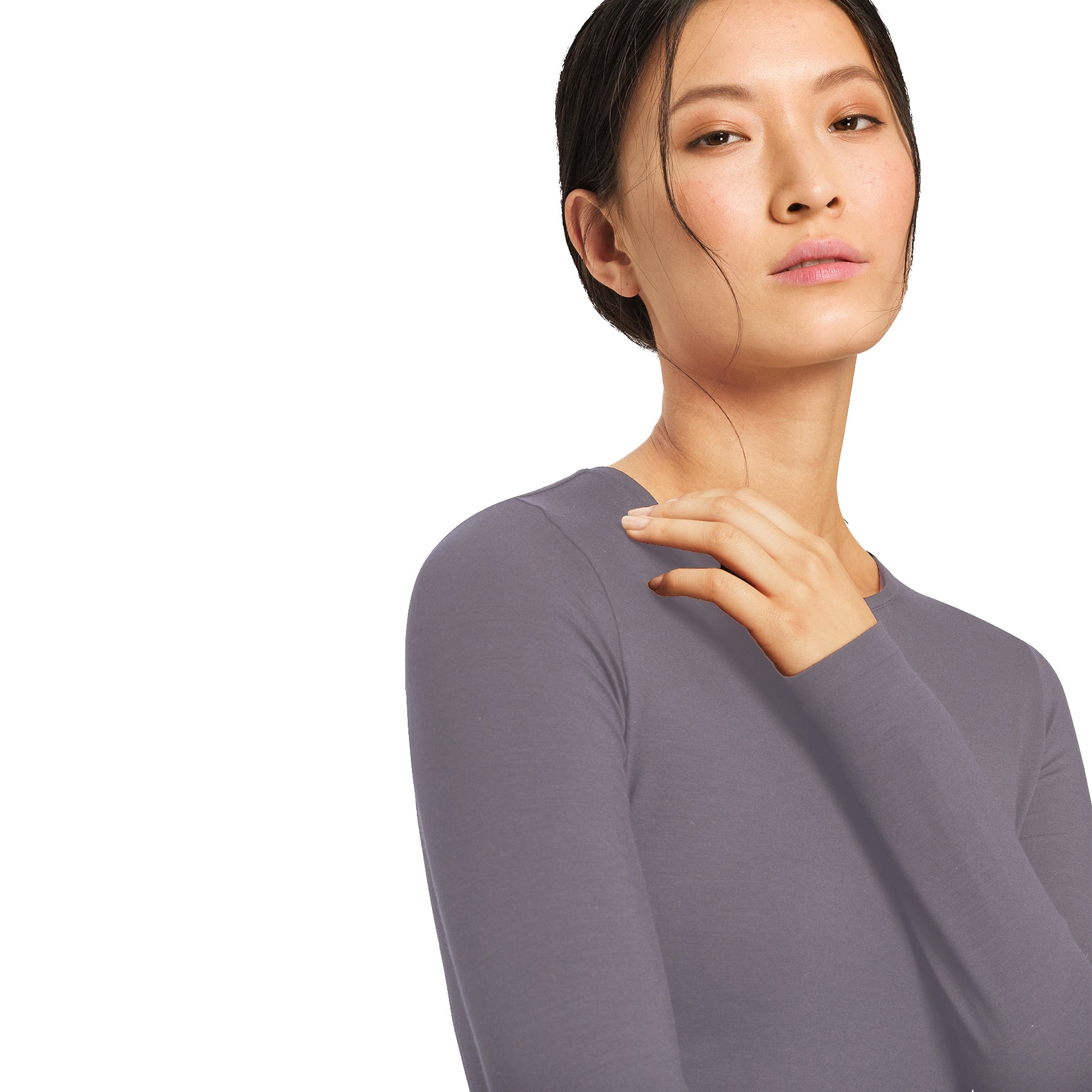 Hanro Soft Touch grey long sleeve top close-up on model, showing soft jersey fabric, round neckline, and refined finish