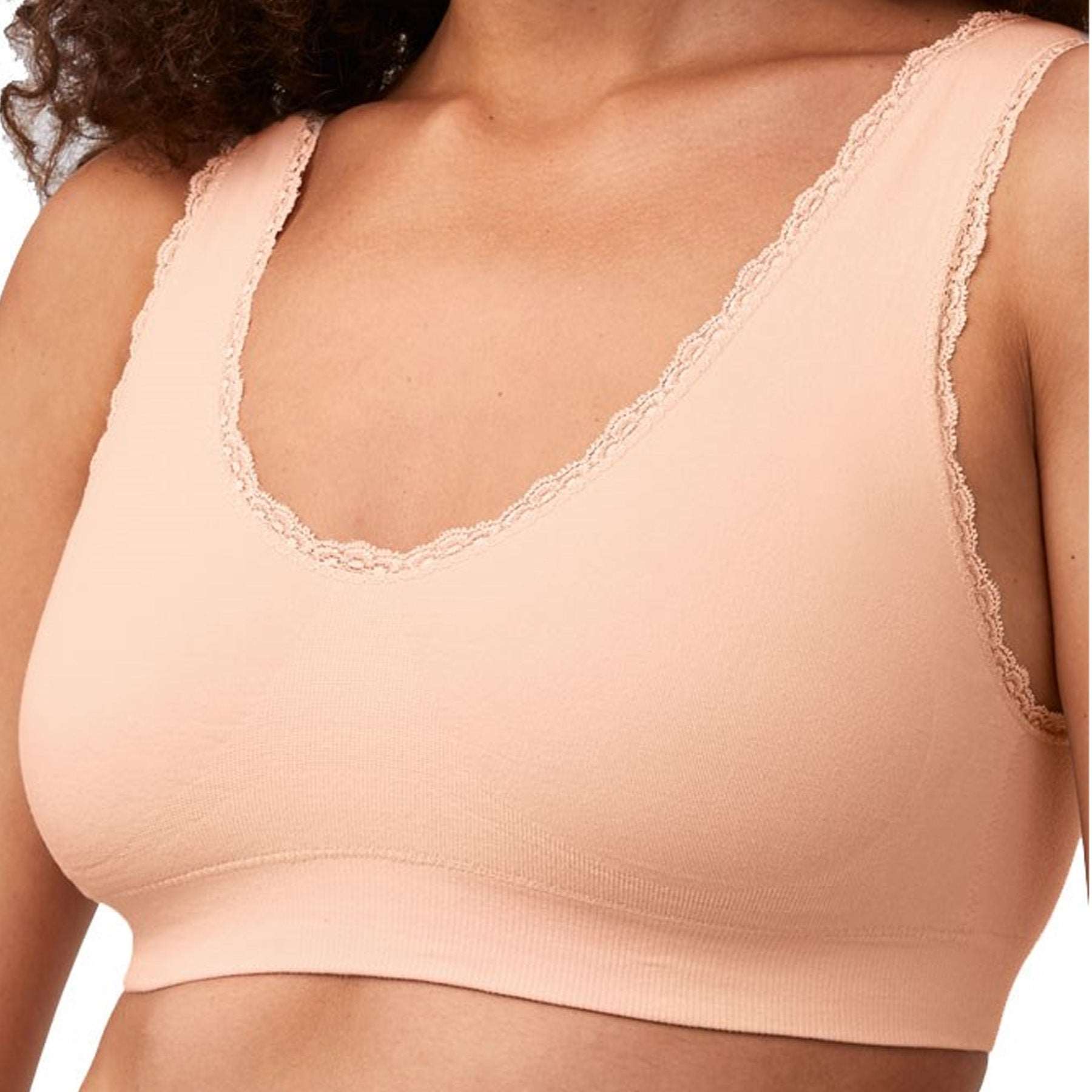 Amoena Kitty Wireless and seamless Bra in peachy pink on model front view