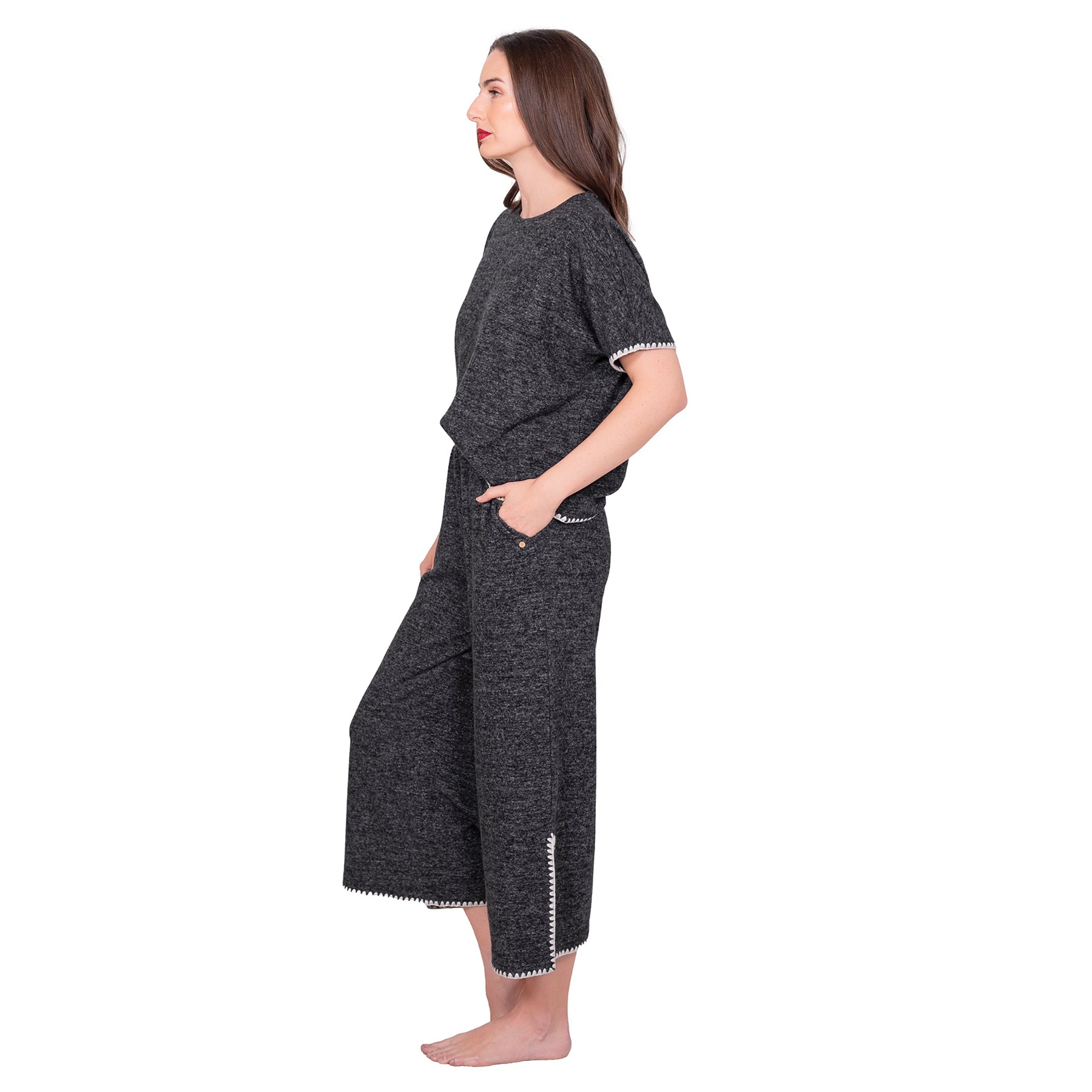 Side view of LatteLove Black Mix lounge set showing short sleeves and wide-leg pants with contrast trim.