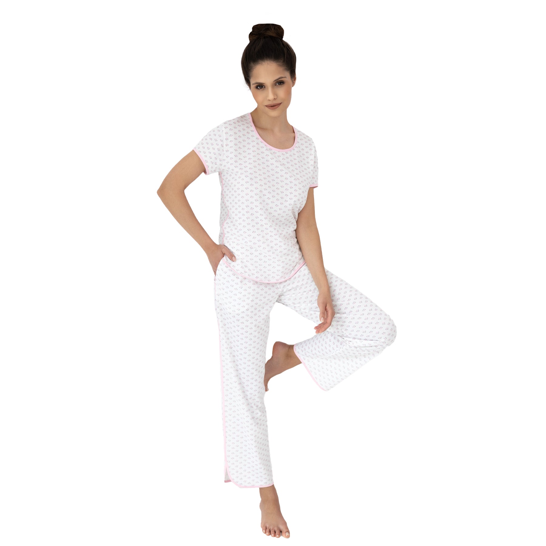White pyjama set with mini pink floral print, short-sleeve top and relaxed straight-leg pants with soft fit