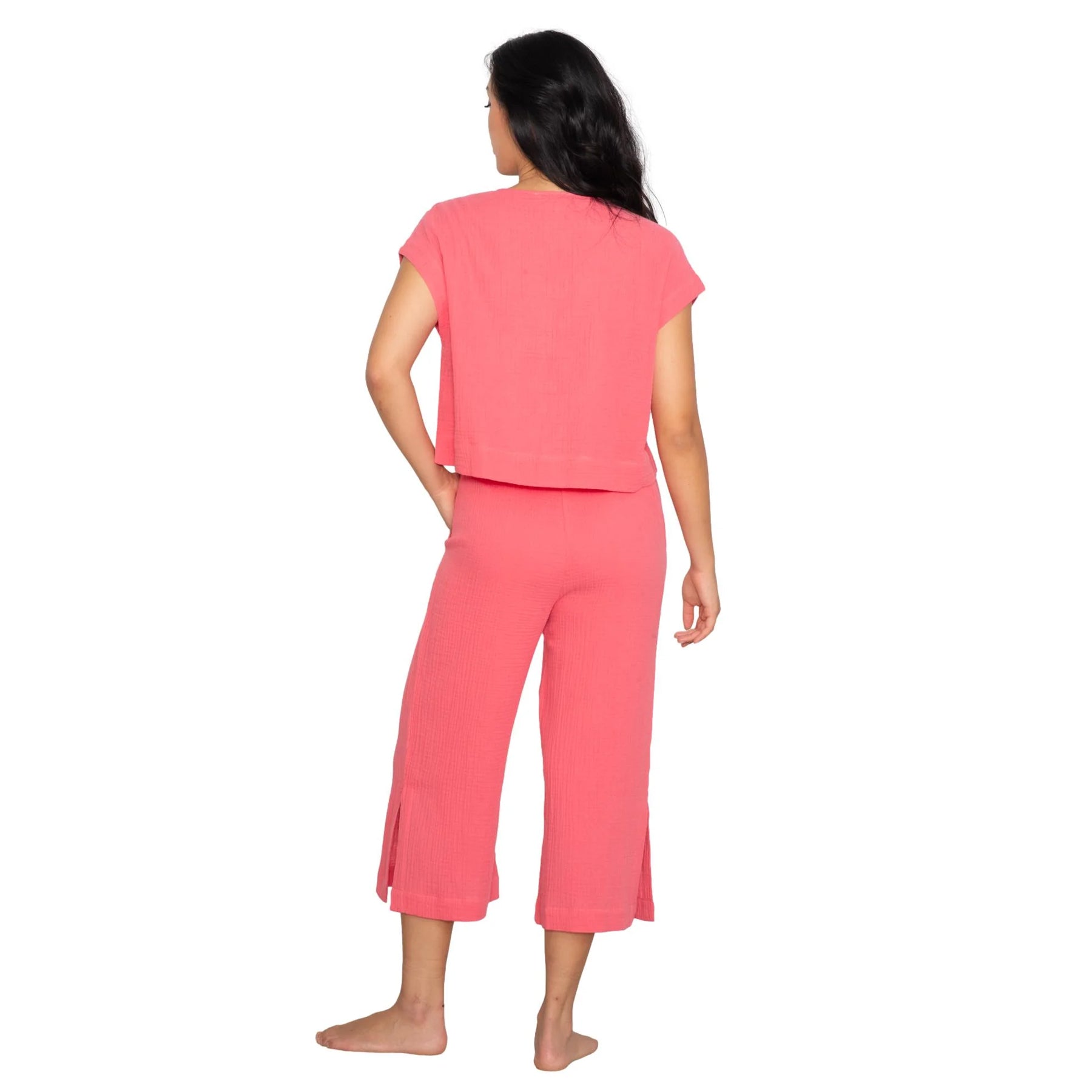 Pink two-piece lounge set with relaxed top and cropped pants, back view