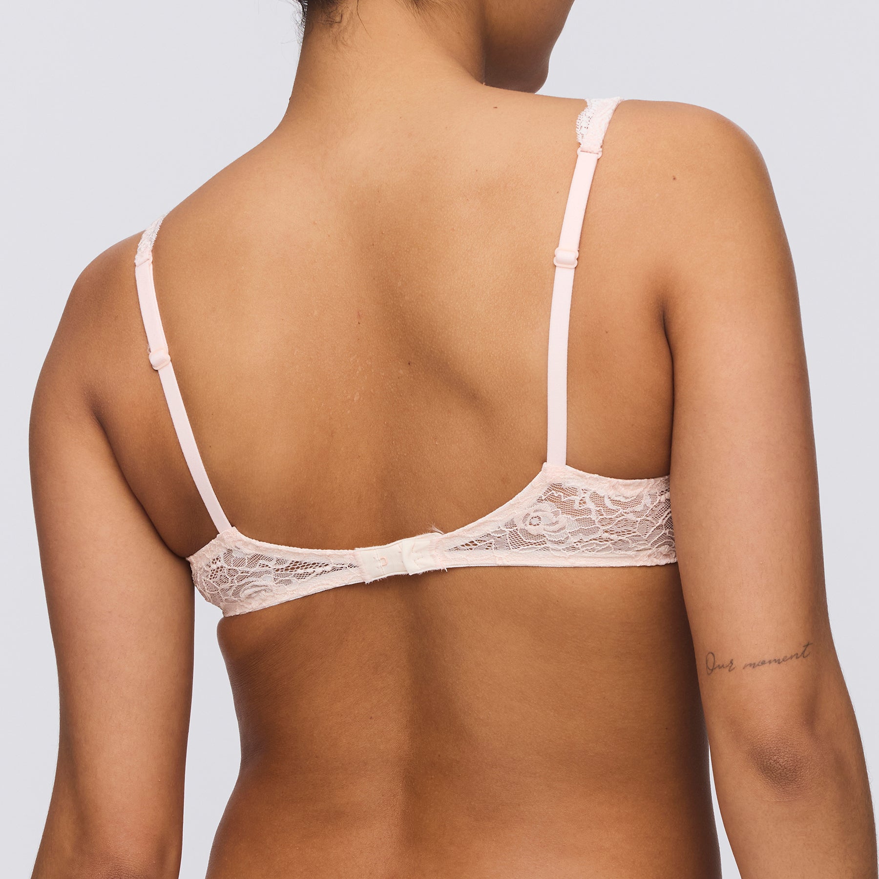 Back view of Marie Jo Cyrile full cup bra in crystal pink, style 010-2920, featuring lace band and adjustable straps