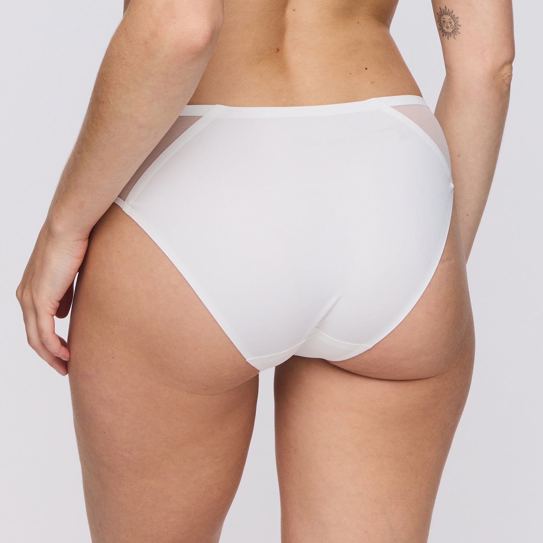 Back view of Marie Jo Louie Rio Panty in Natural, showcasing seamless microfiber design for a smooth finish under clothes.