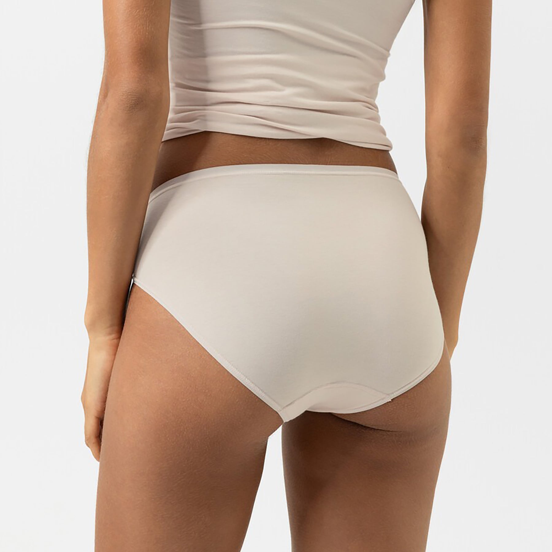 Back view of Mey organic cotton bikini panty in Bailey beige with seamless finish and full coverage
