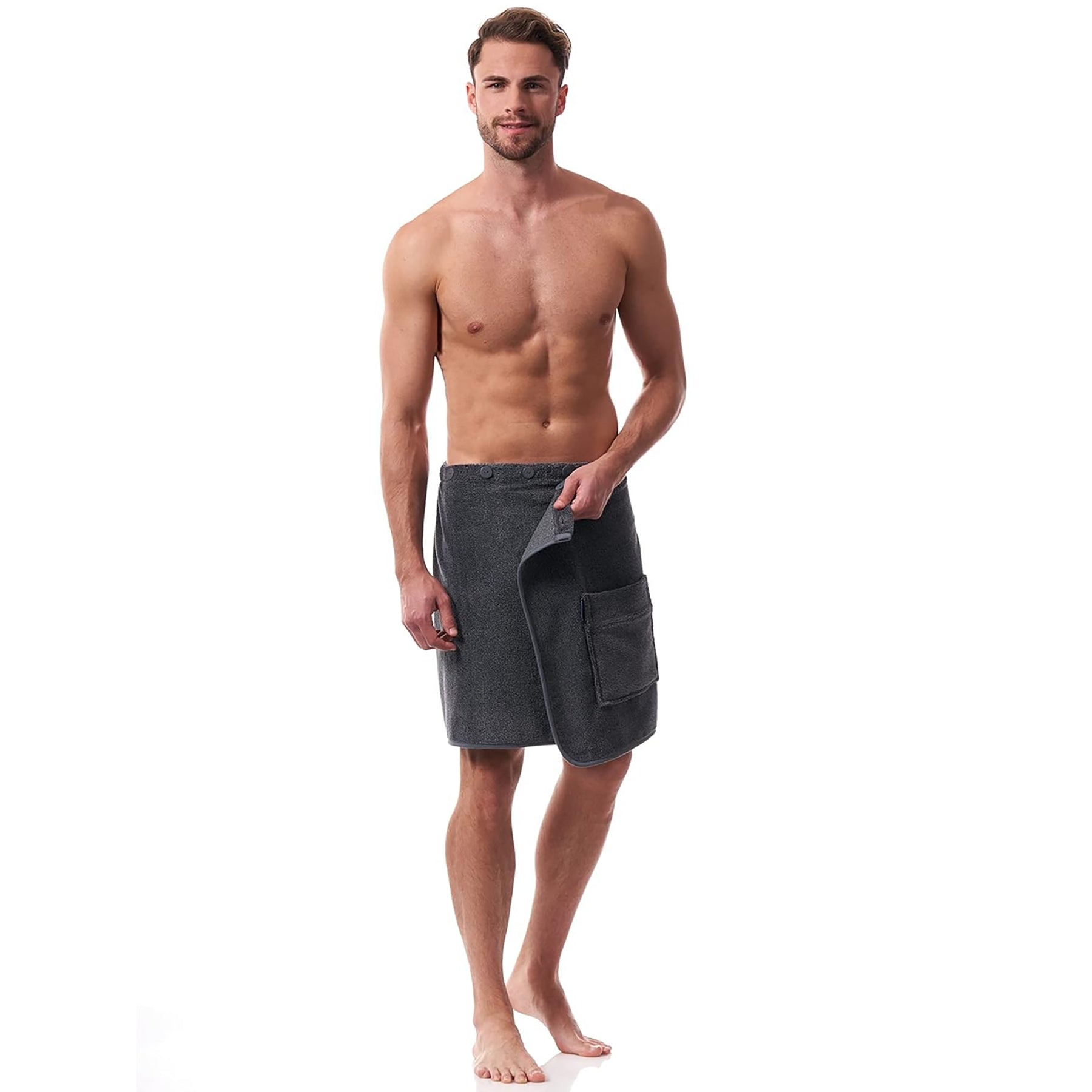 Full body view of man in dark grey towel wrap with adjustable button front – great for sauna or post-shower.