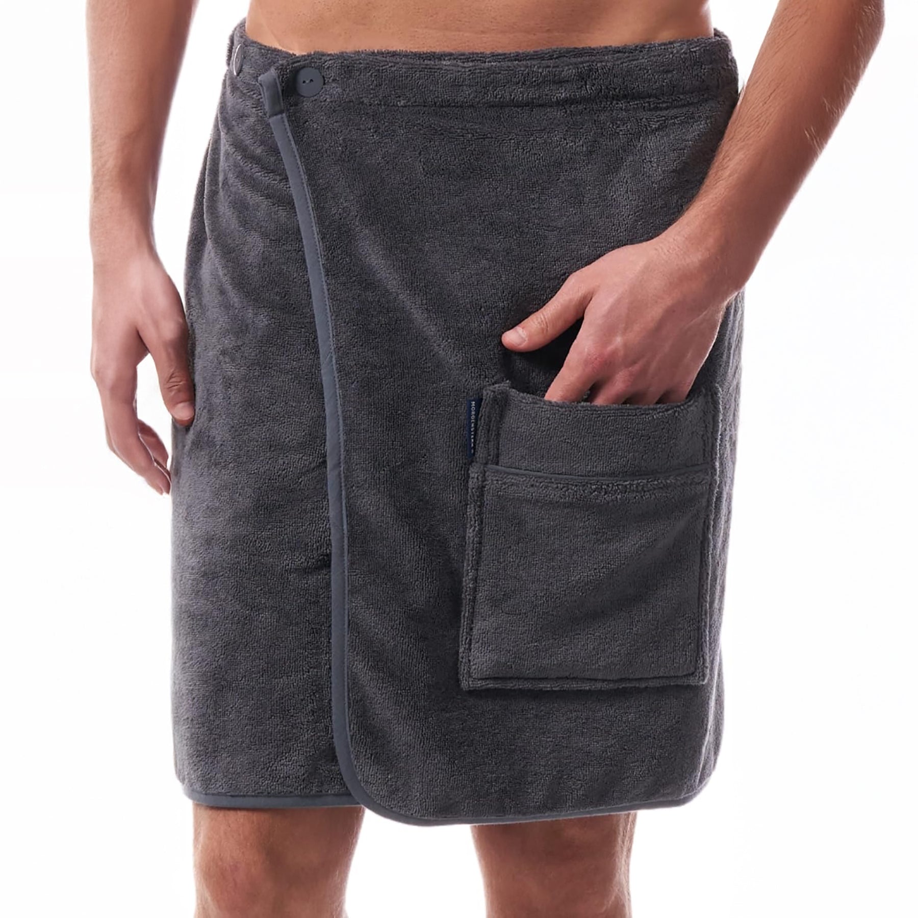 Man wearing graphite grey towel wrap with front pocket – absorbent, comfortable, and spa-ready.