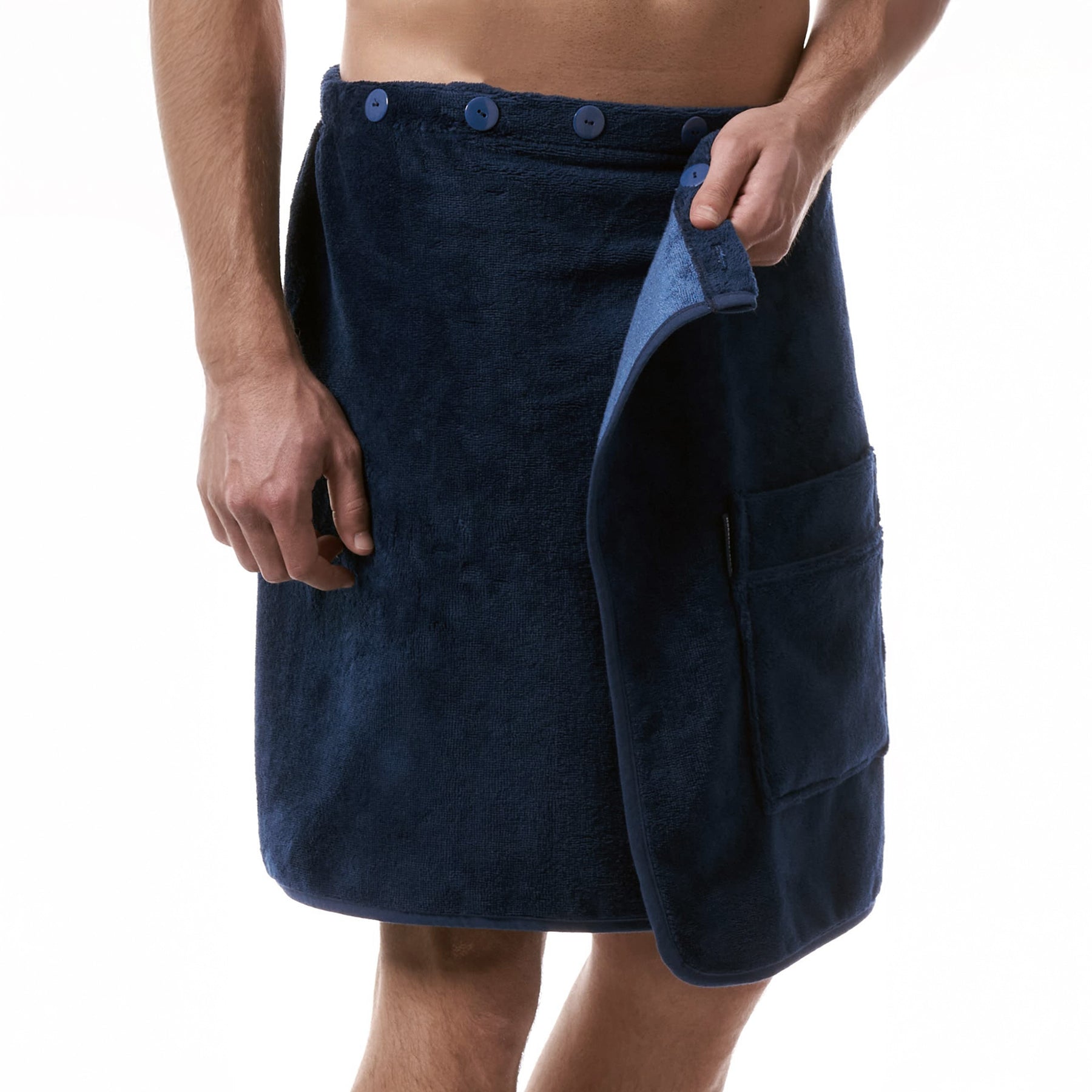 Close-up of adjustable button closure on night blue men's towel wrap – secure and easy to wear.