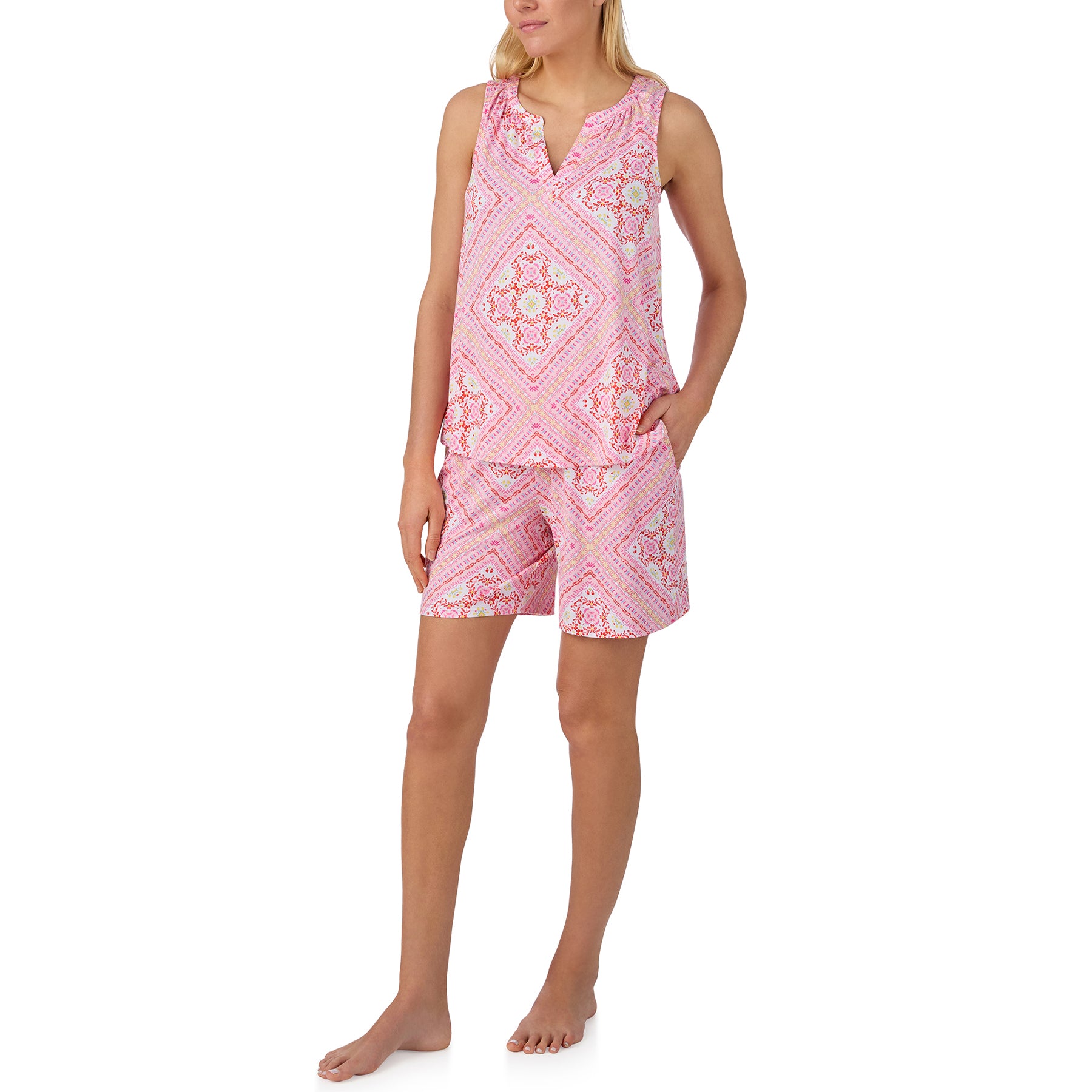 Lightweight pink sleepwear set with sleeveless notch-neck top and coordinating geometric print shorts