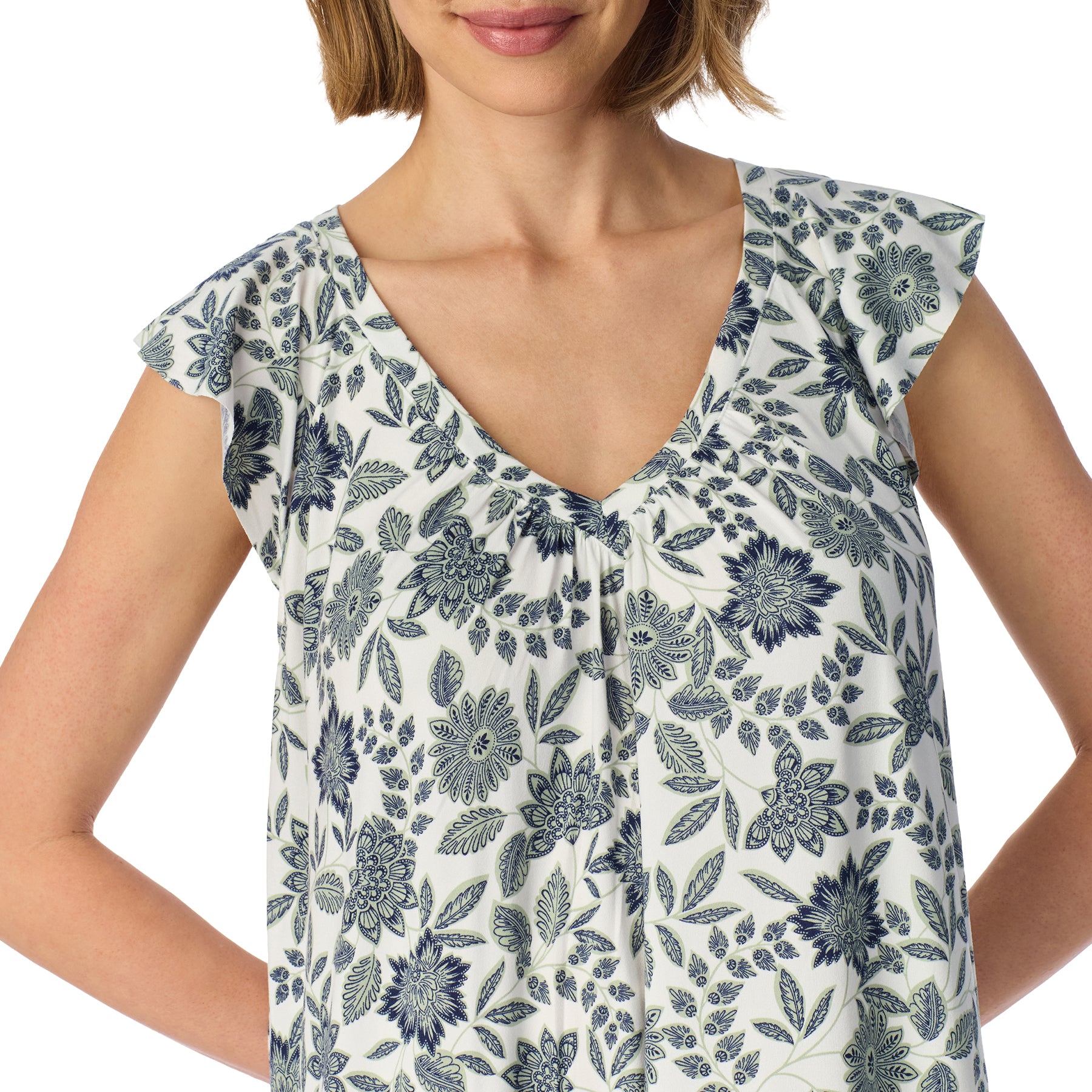 Women's knee-length nightgown in a white and blue floral print with flutter sleeves, a gathered V-neck, and a loose, comfortable silhouette.