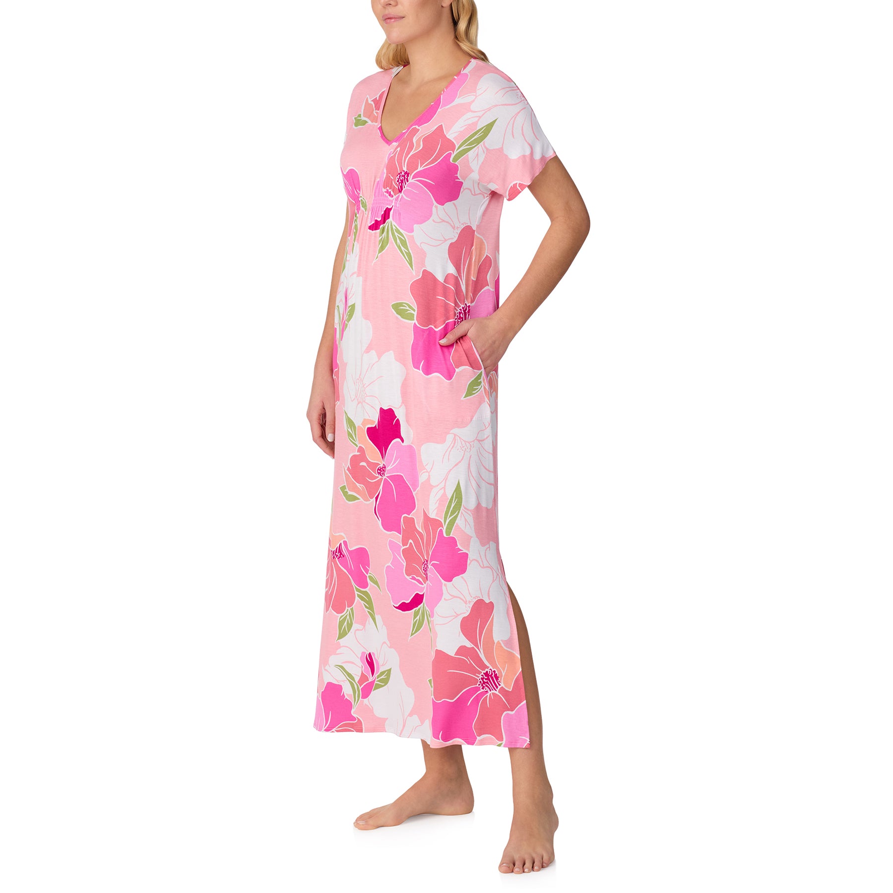 Side view of a women’s pink floral nightdress with short sleeves and subtle side slit at the hem.