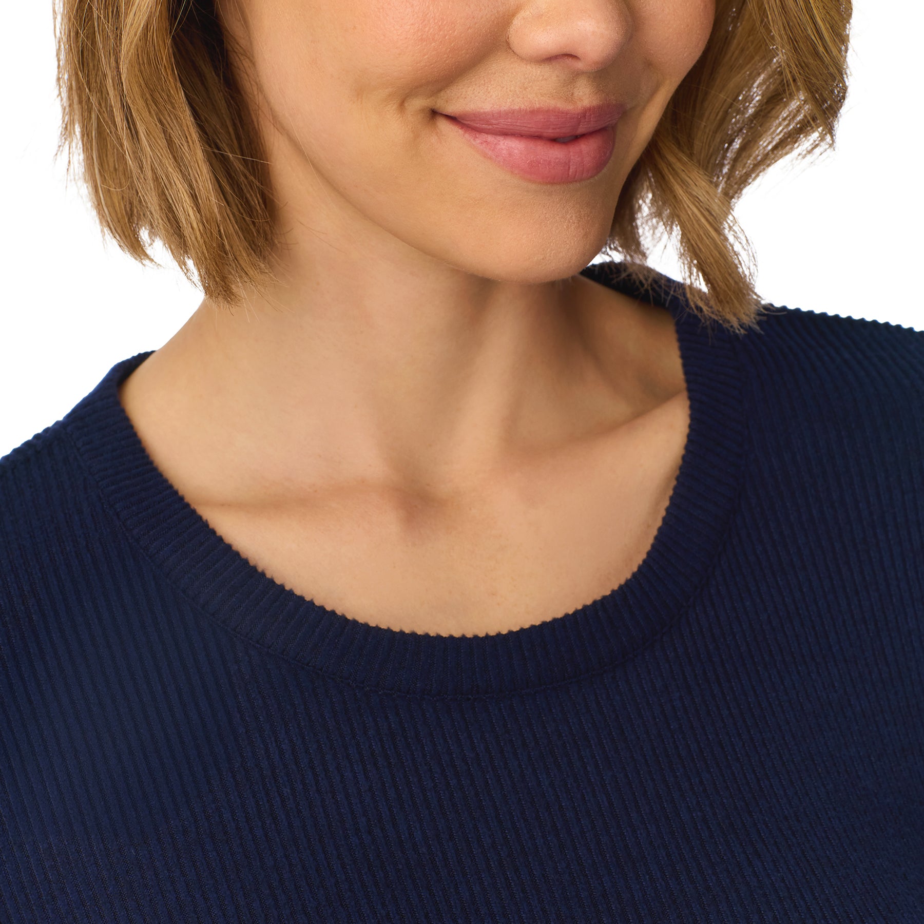 Close-up of navy ribbed long-sleeve pajama top showing the soft textured fabric and classic crew neckline.