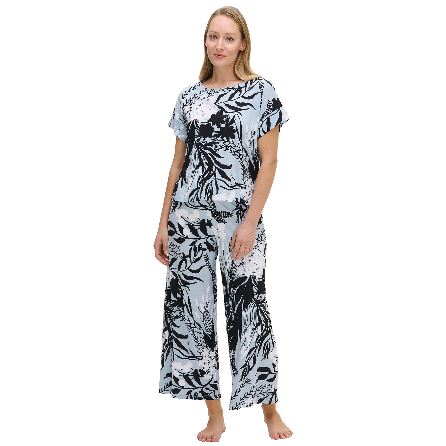 Model wearing grey Nanso cotton loungewear set with bold botanical pattern