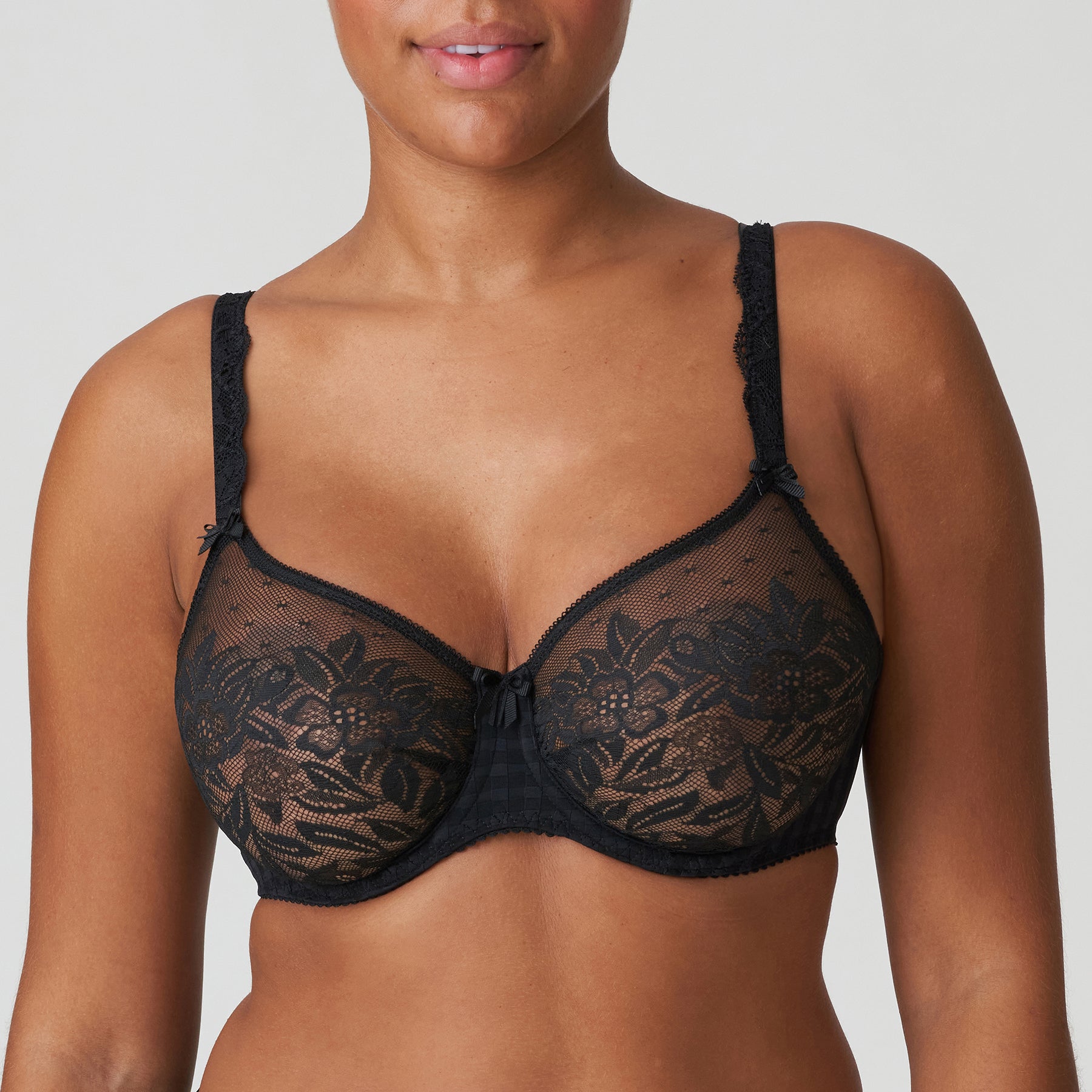 PrimaDonna 026-2127 Madison Full Cup Seamless Bra in Black with sheer floral lace and supportive full-cup design.