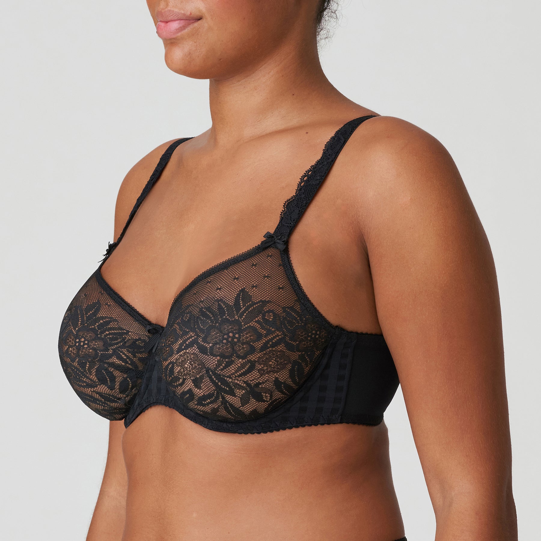 Side profile of PrimaDonna 026-2127 Madison Full Cup Seamless Bra in Black with elegant lace overlay and seamless finish.