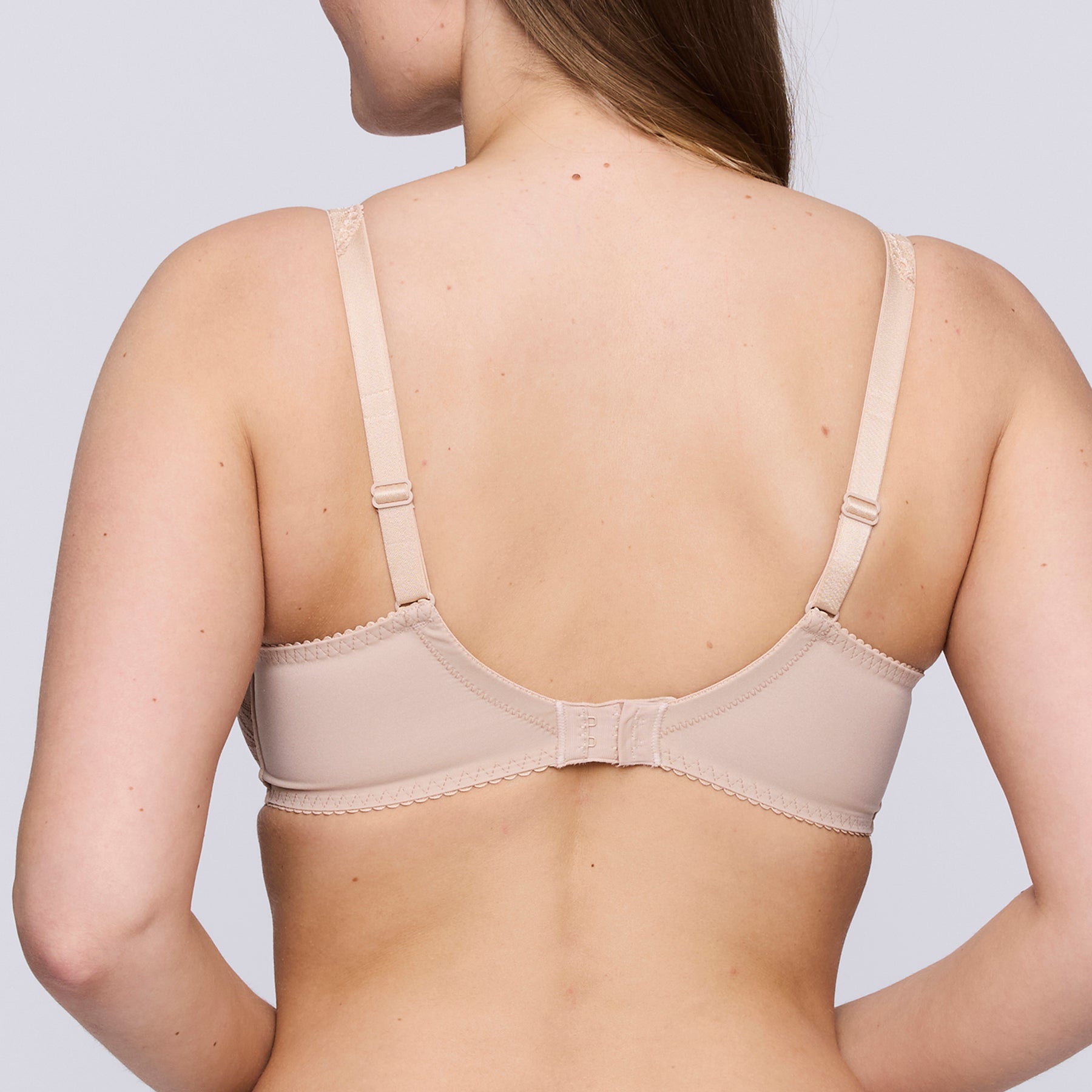 Back view of PrimaDonna 026-2127 Madison Full Cup Seamless Bra in Caffè Latte with adjustable straps and smooth support band.