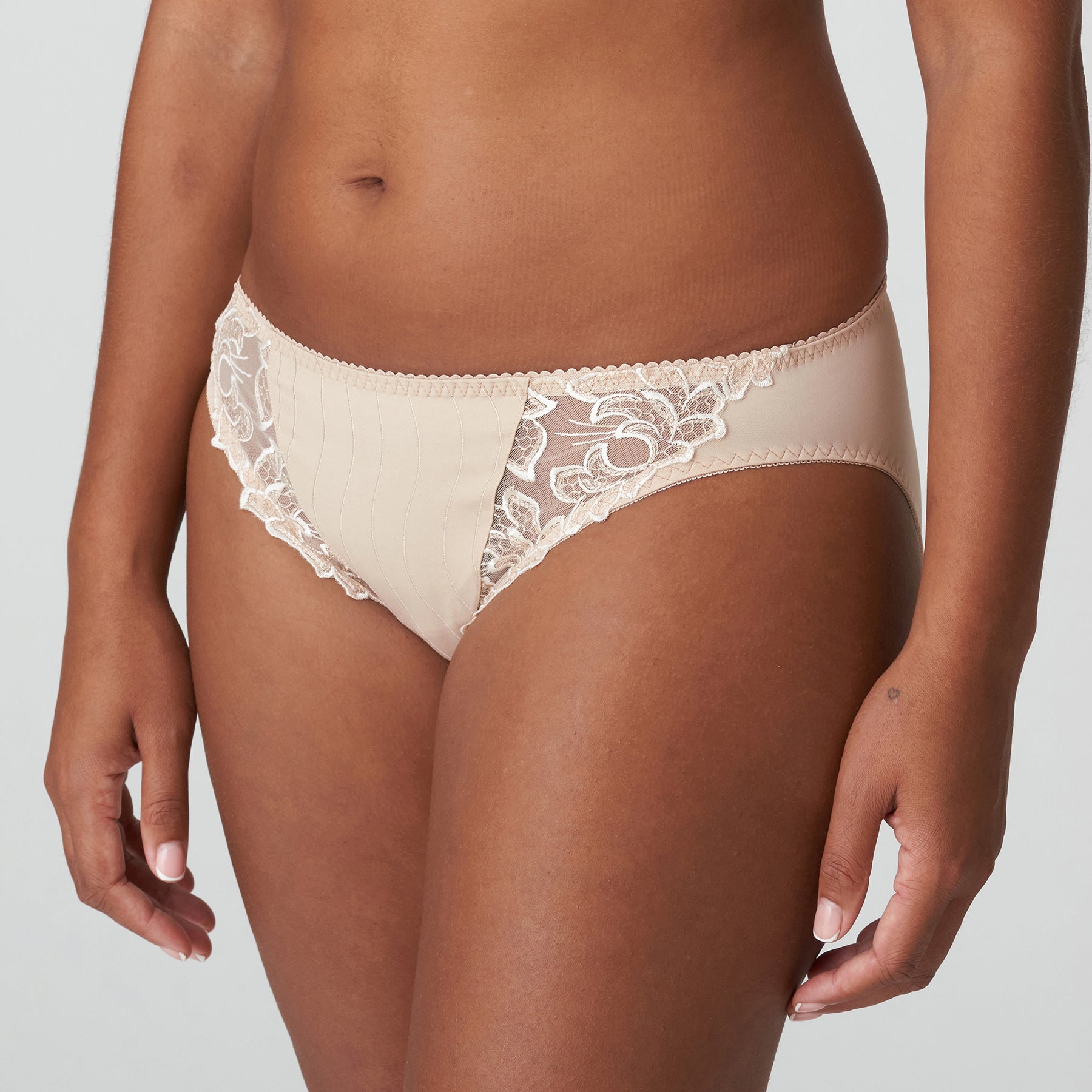 deauville nude rio bikini brief with lace detail front/side view on model