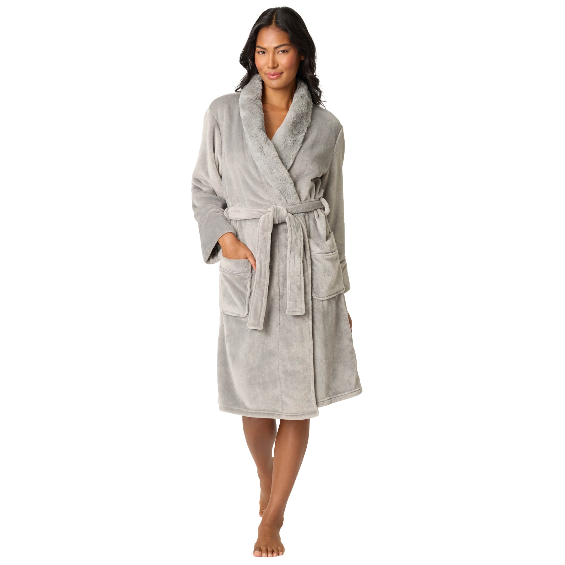 Woman wearing a gray robe on a white background