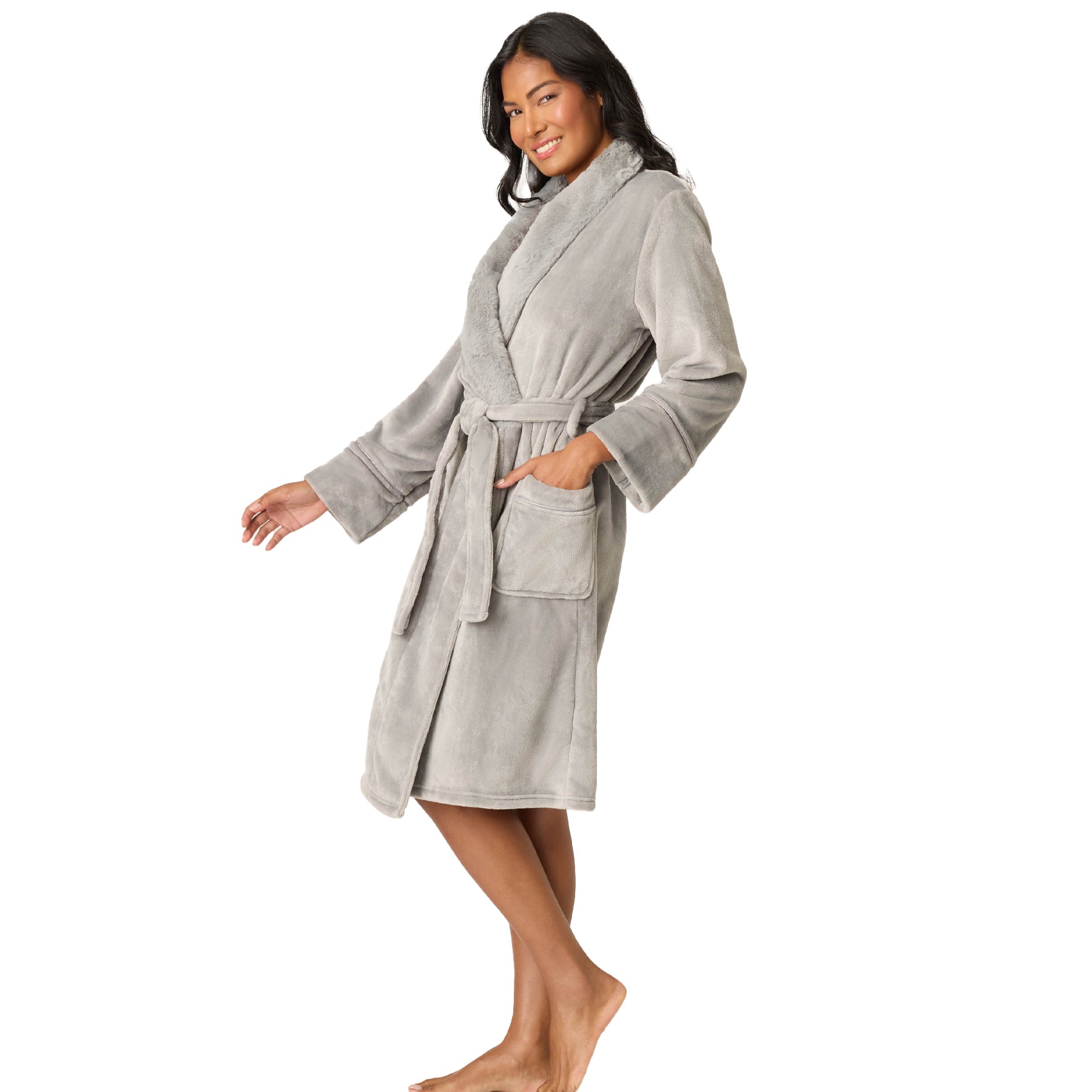 Woman wearing a gray robe on a white background