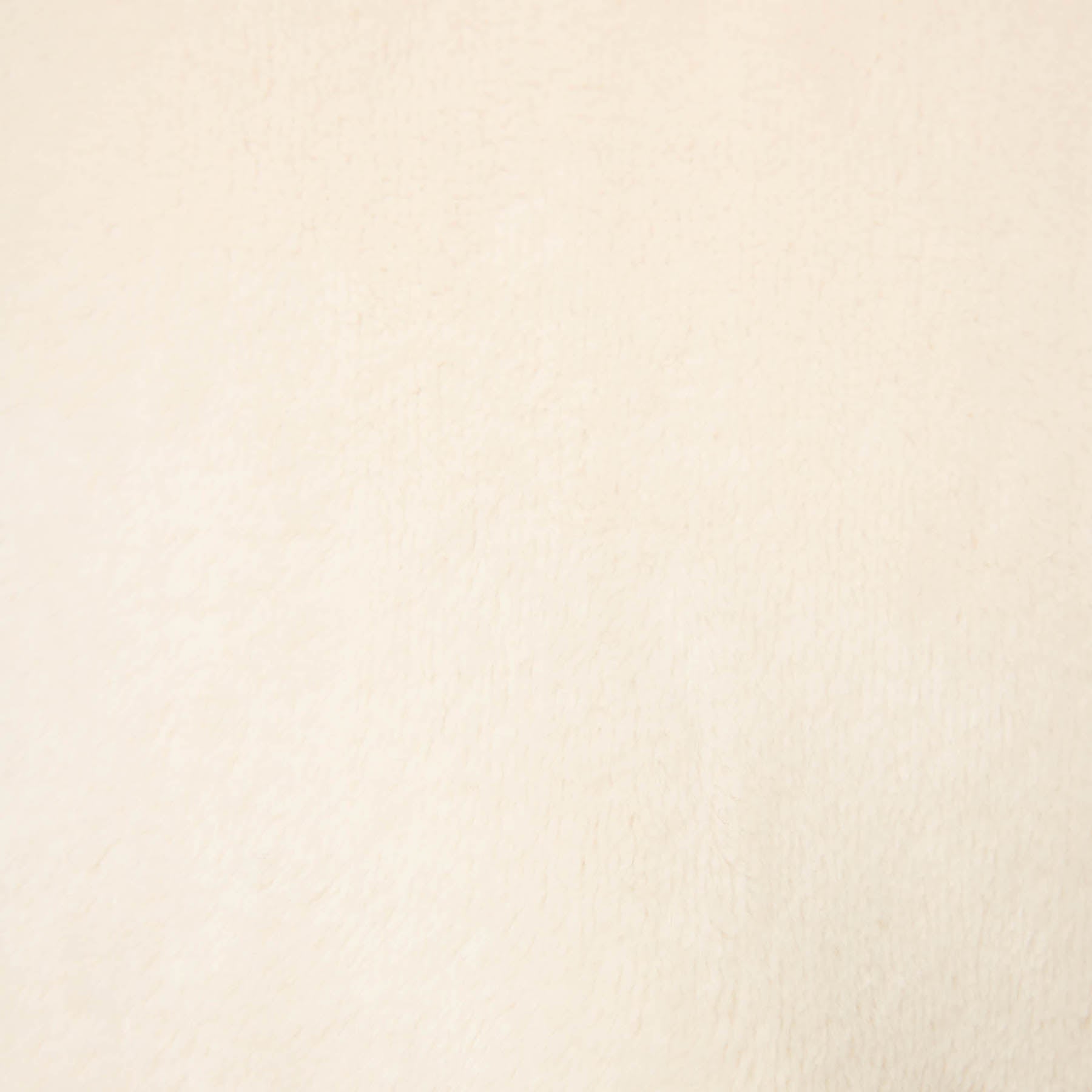 Beige color swatch with a textured pattern