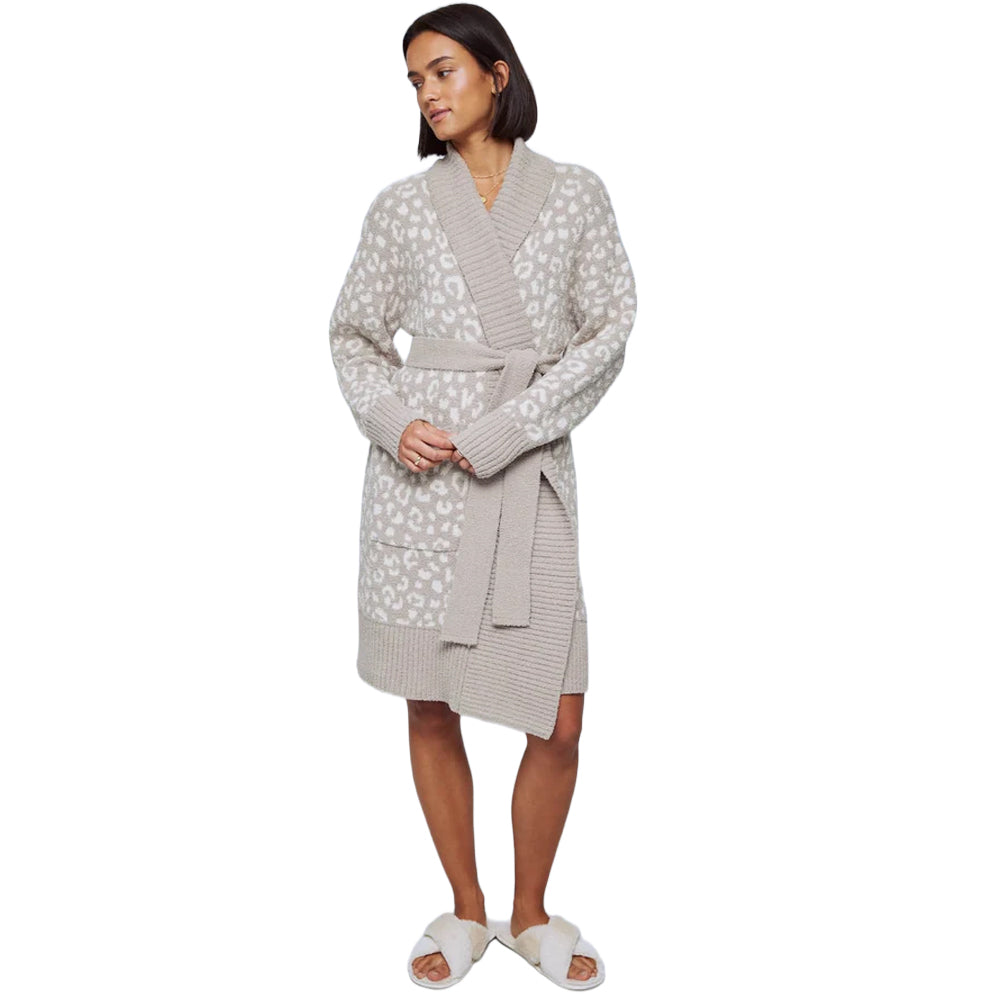 Model wearing a cozy beige and ivory leopard-print knit robe with a ribbed shawl collar, matching waist tie, long sleeves, and front patch pockets.