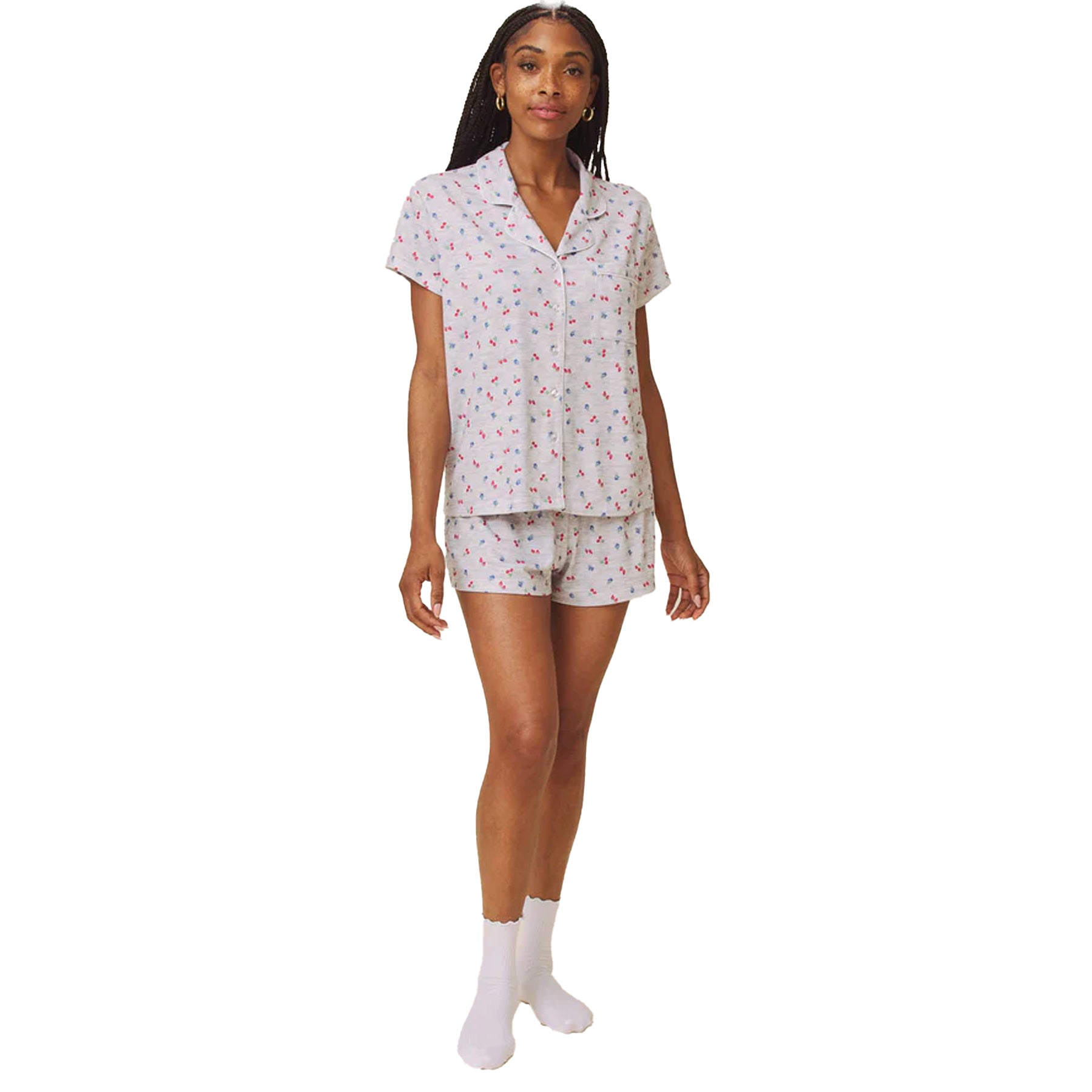 Full body view of model wearing grey fruit print pyjama set with short sleeves and shorts