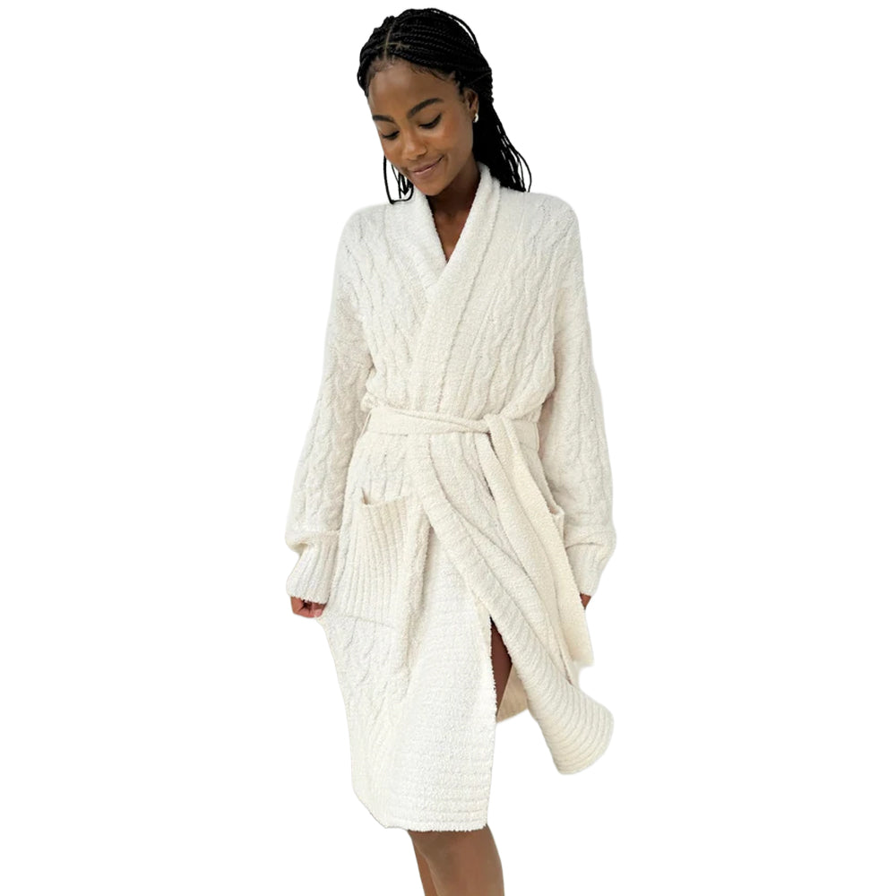 Model wearing Splendid ivory knee-length robe with a soft textured knit, shawl collar, long sleeves, front patch pockets, and matching waist tie belt.