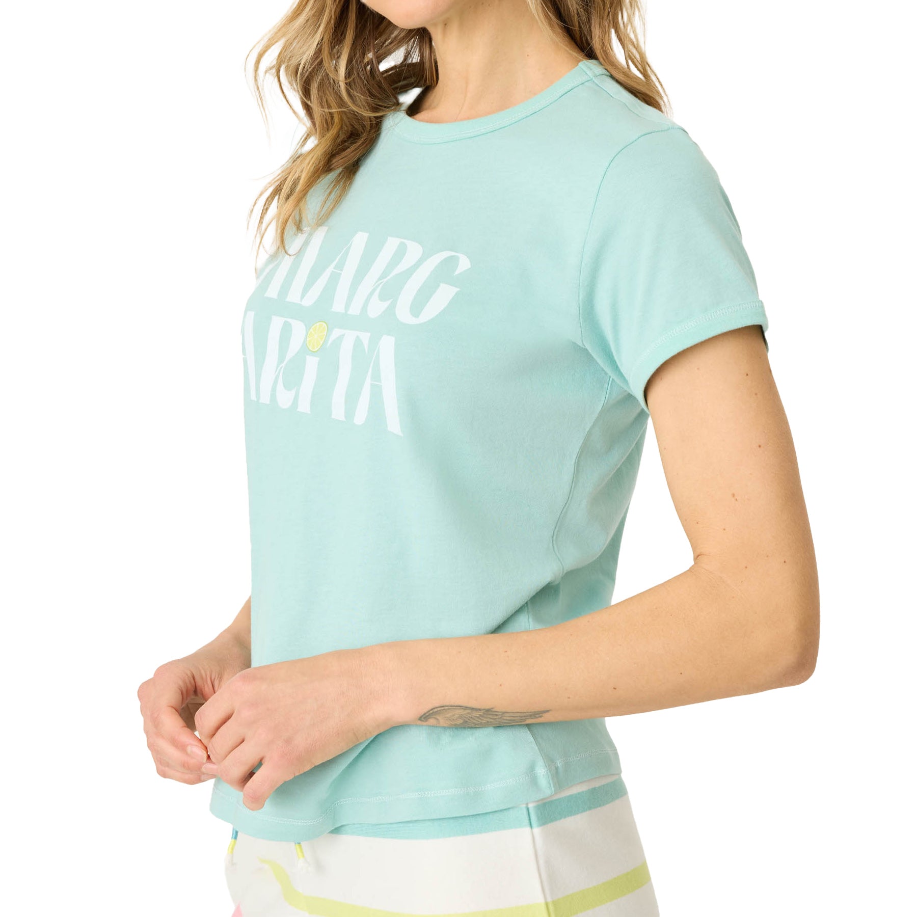 Side view of mint green "Margarita" print pajama t-shirt with rolled sleeves and relaxed fit.
