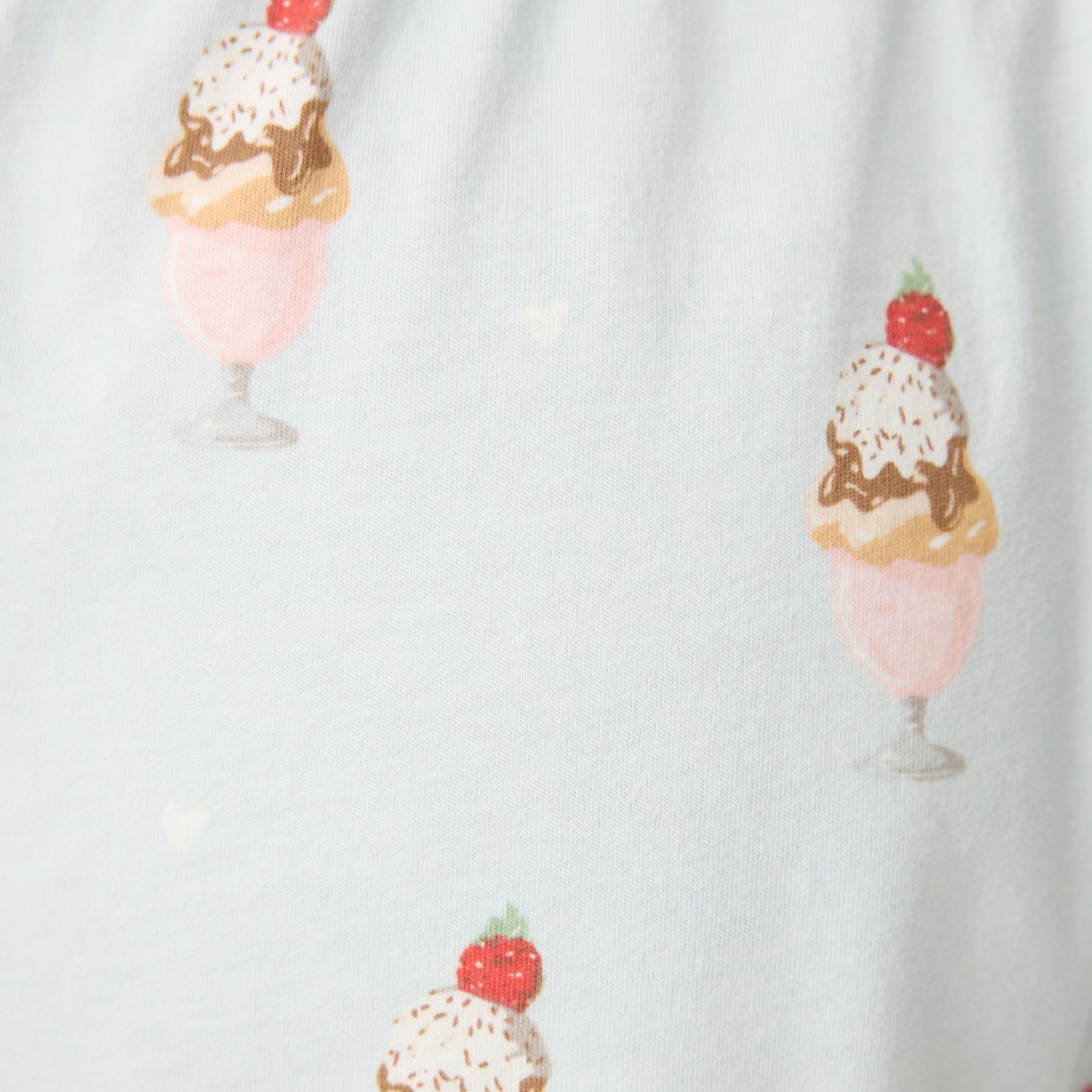 Ice cream cone pattern on a light blue background