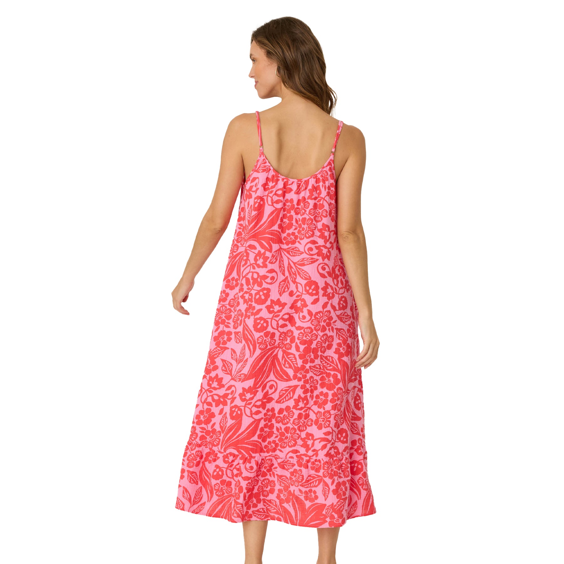 Back view of woman in pink and red floral print sleeveless midi dress with pockets
