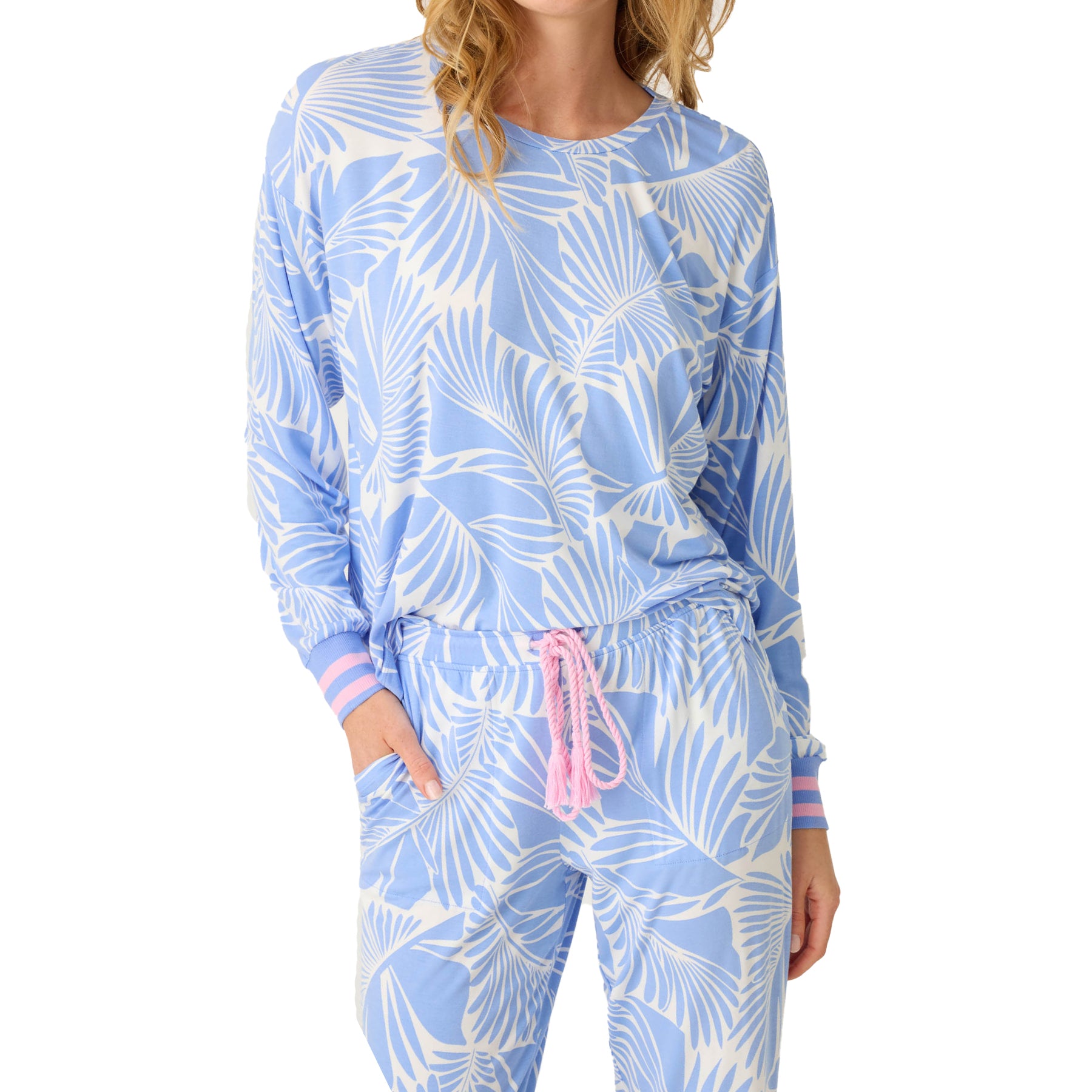 Front view of blue and white tropical print lounge set with pink drawstring and striped cuffs.