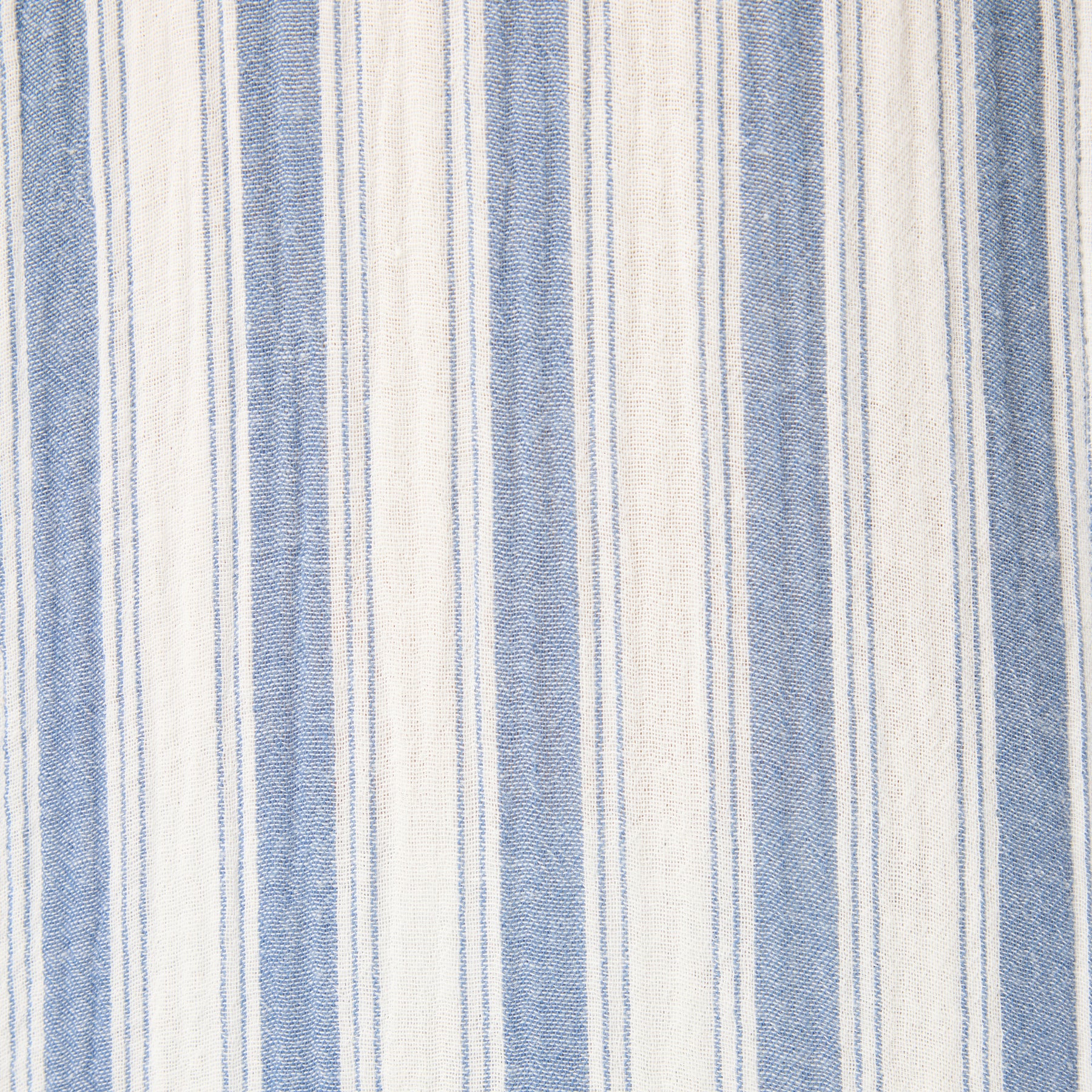 Close-up of a lightweight textured fabric with vertical ivory and light blue stripes.