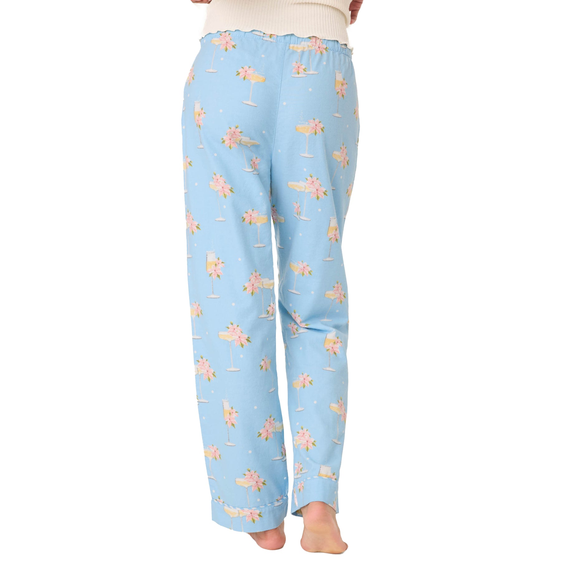 Light blue pajama pants with a floral pattern on a white background