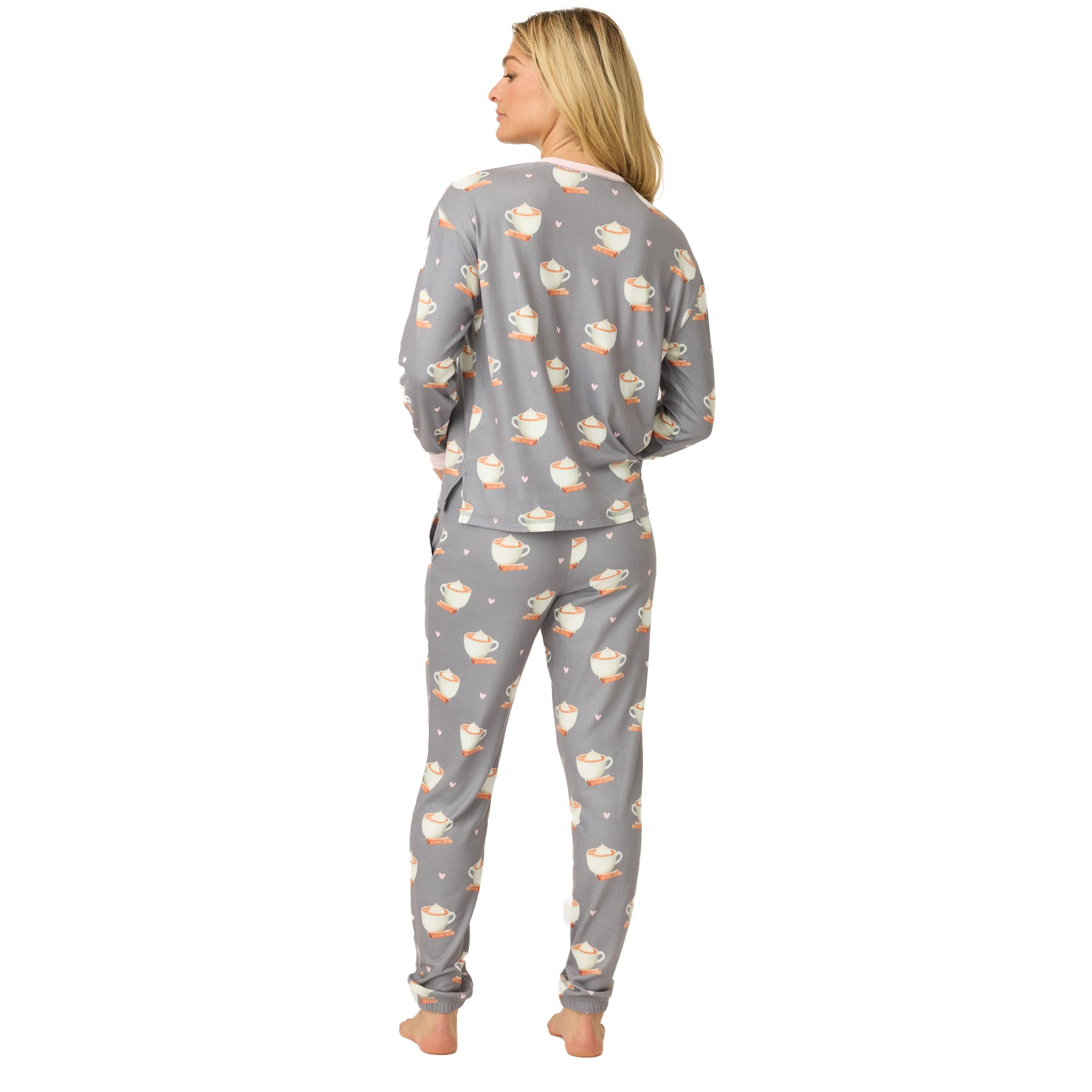 Back view of women’s grey pajama set decorated with hot cocoa mugs and pink hearts.
