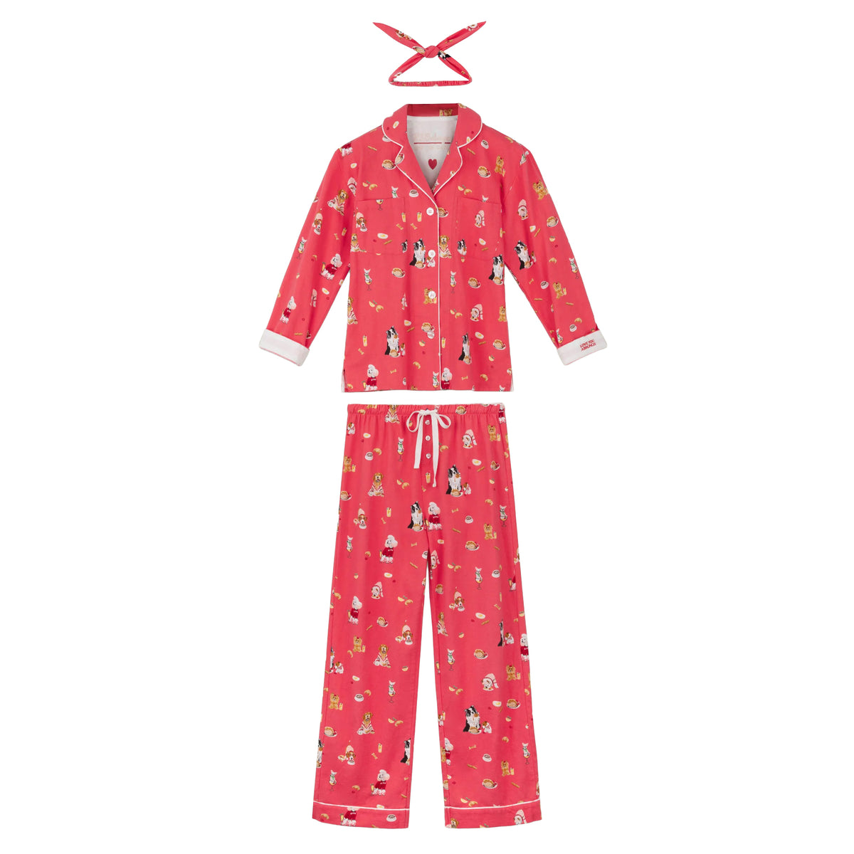 PJ Salvage Brunch Pups coral flannel pyjama set with long sleeve button-down top, matching pants and headband, flat lay.