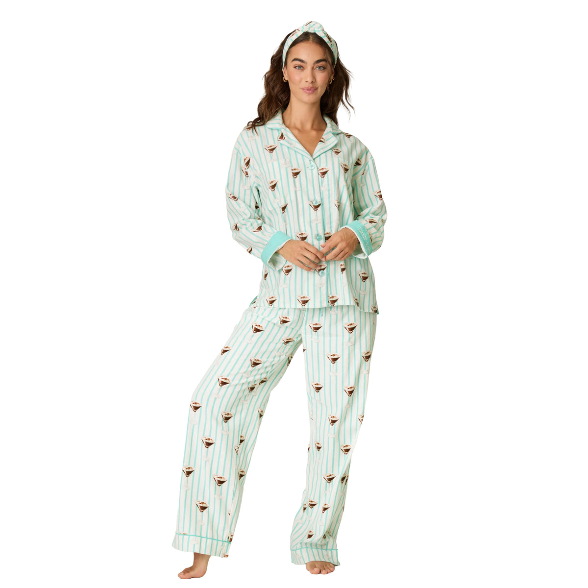 Model wearing PJ Salvage Tipsy Time long sleeve pyjama set in Pool Blue with mint stripes and cocktail glass print, front view.