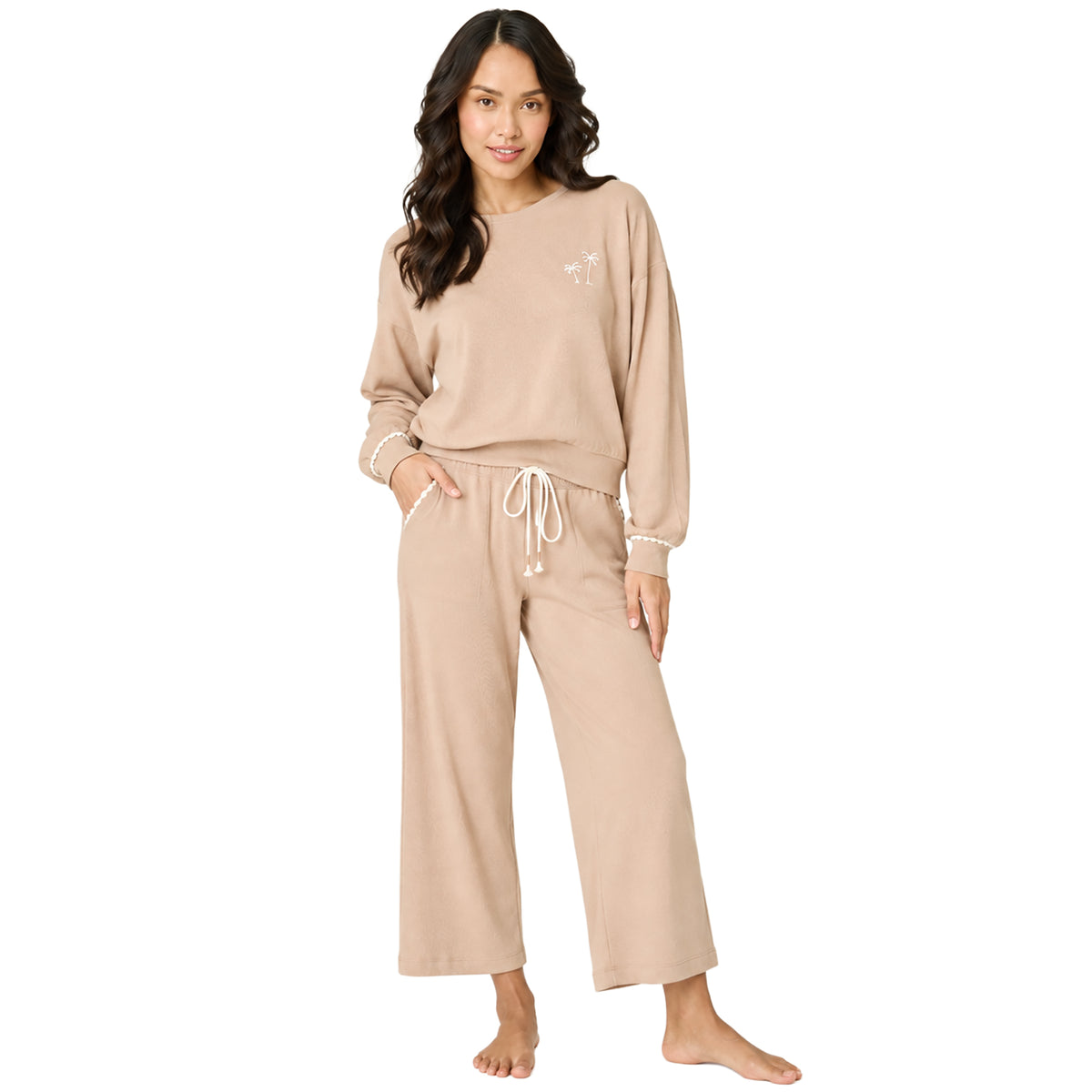Women's warm taupe lounge set featuring a relaxed long sleeve sweatshirt with embroidered palm trees and matching drawstring pants with scalloped trim pocket.