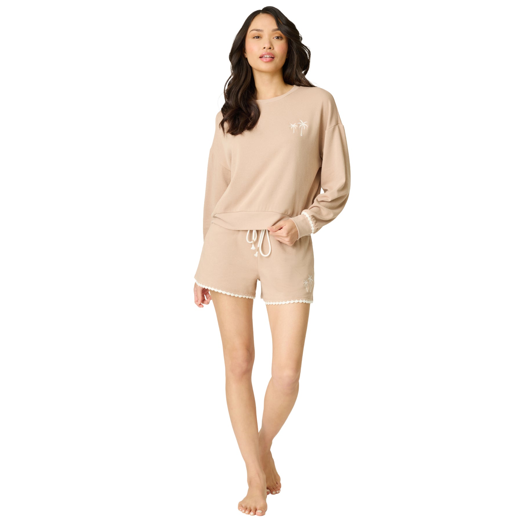 Women's warm taupe long sleeve lounge set with a relaxed sweatshirt, embroidered palm tree motif, and matching shorts with scalloped trim.